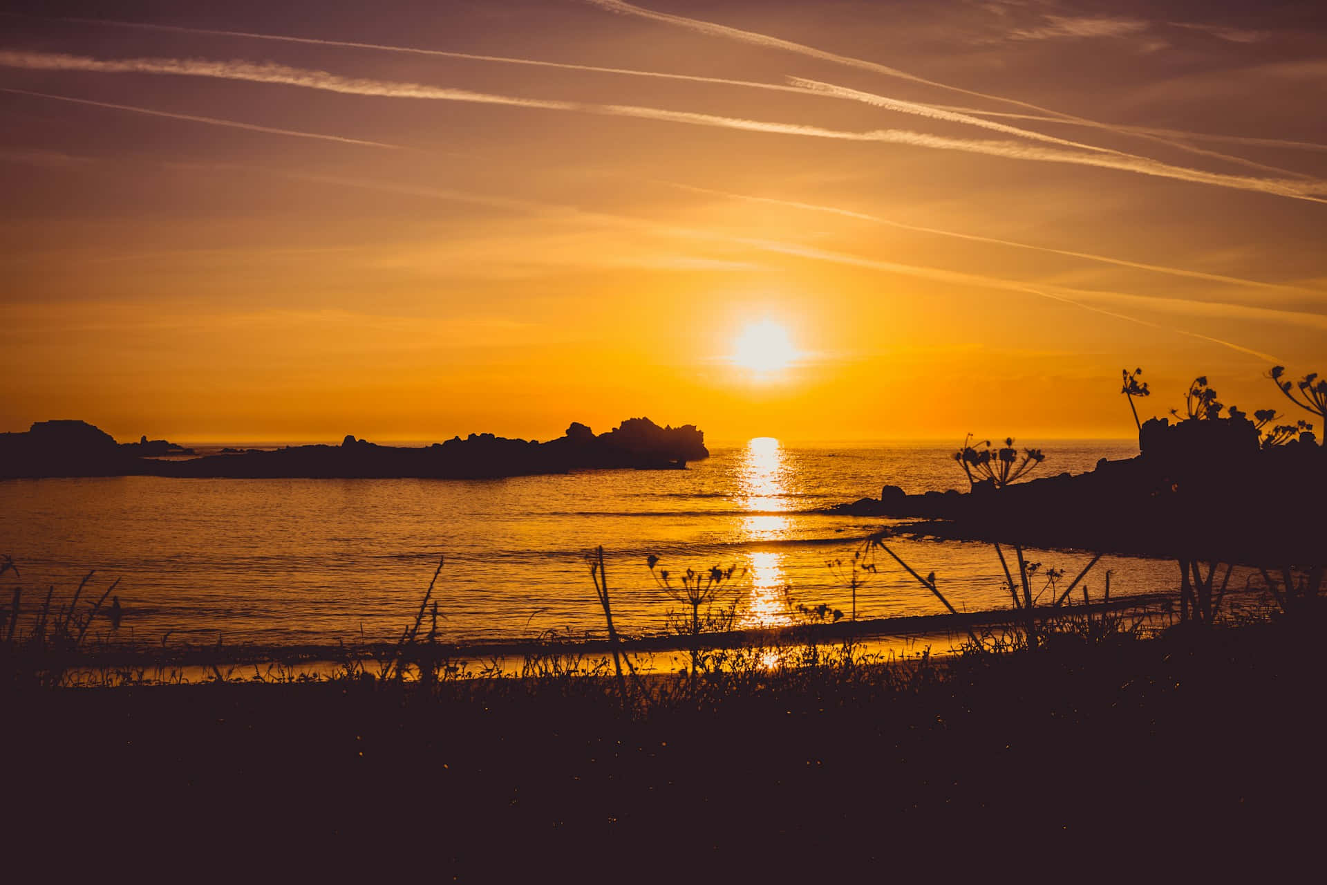golden sunset, calm waters, silhouetted rocks, Full HD Desktop Wallpaper
