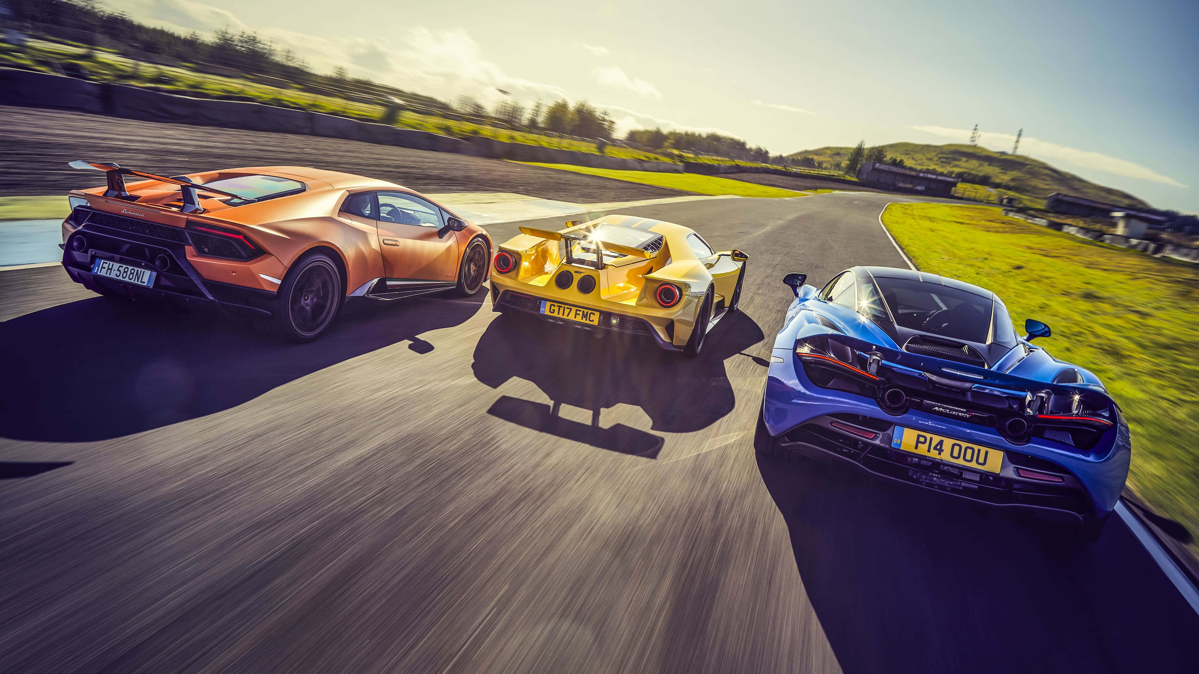 supercar race, high-performance supercars, sunlit track, 4K Desktop Wallpaper