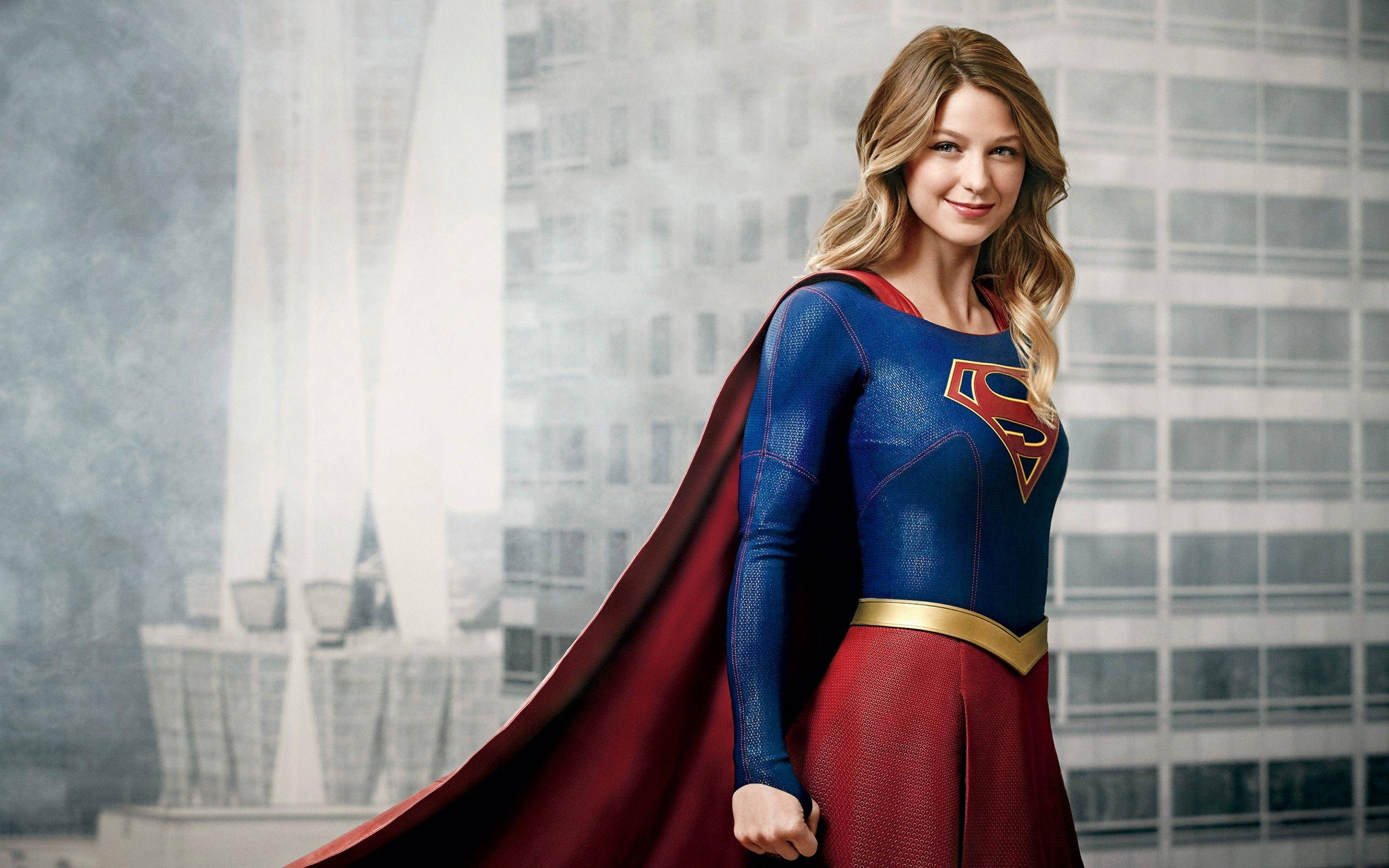 Supergirl, blue and red costume, flowing cape, 2K Desktop Wallpaper
