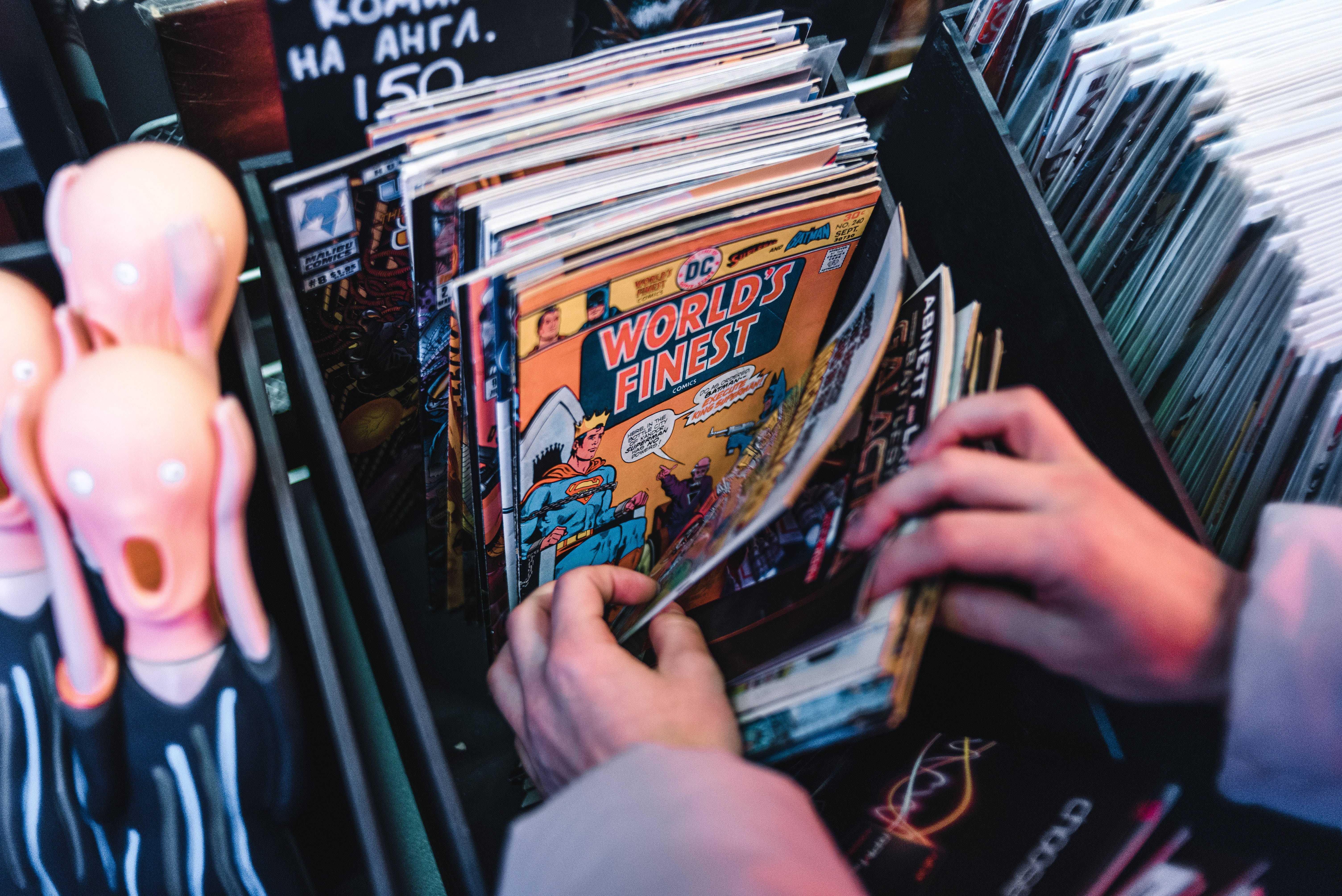 Superhero Supreme, vintage comic books, dimly lit store, 5K Desktop Wallpaper
