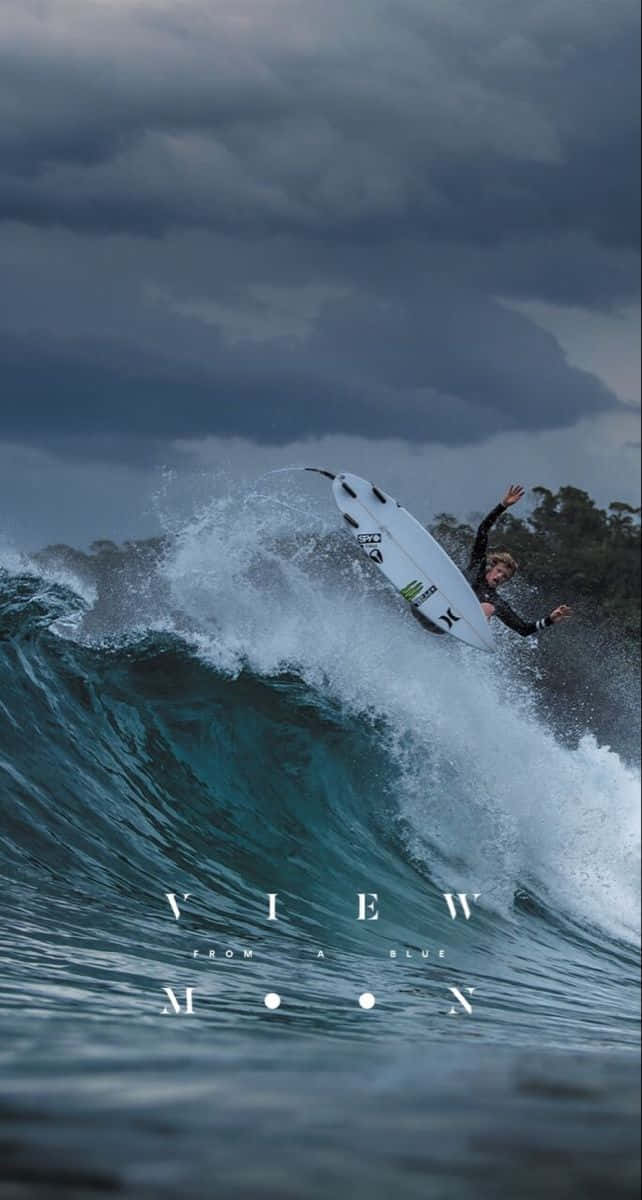 Surfing iPhone, teal wave, stormy sky, SD Phone Wallpaper