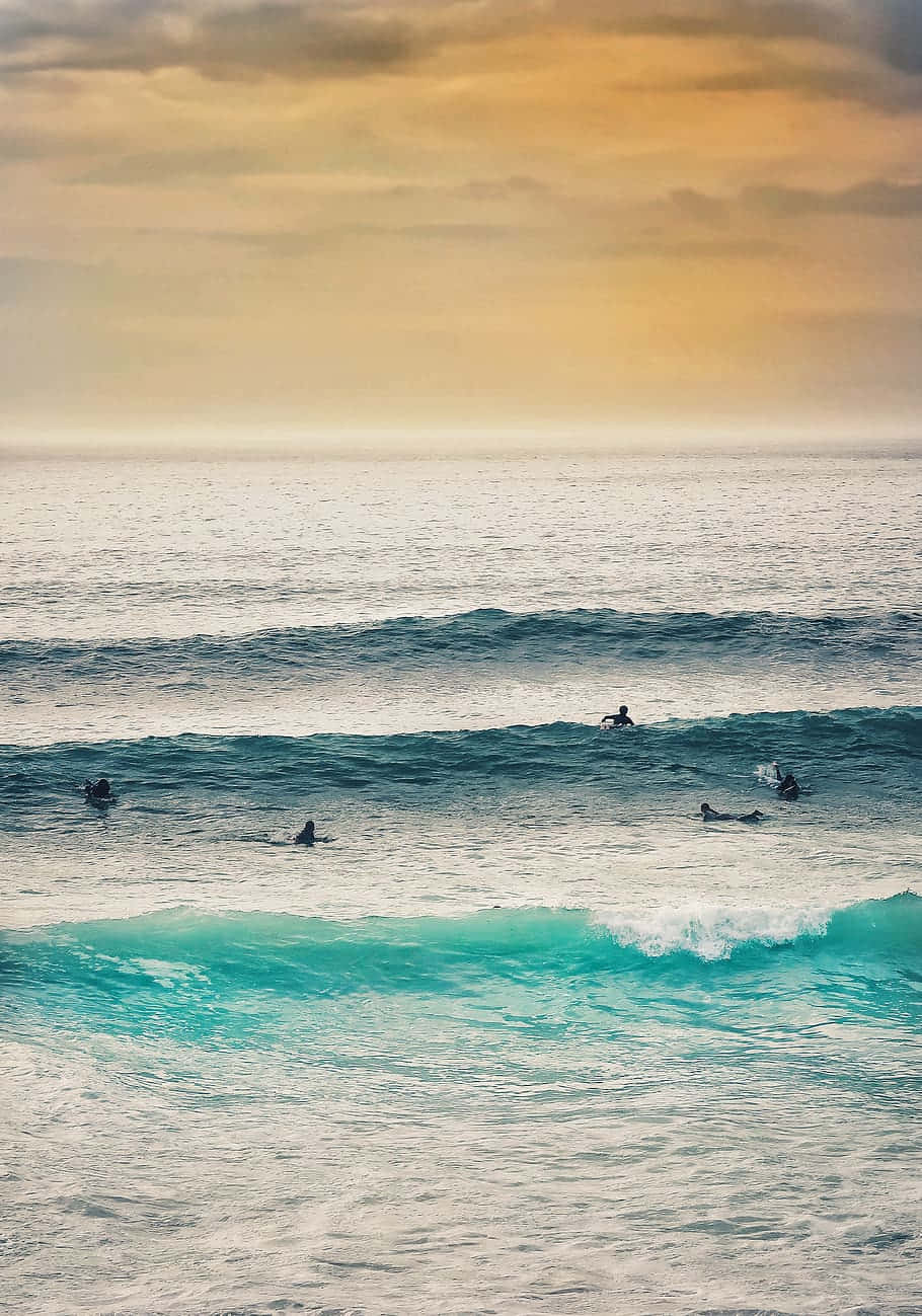 Surfing iPhone, turquoise waves, golden sunset sky, HD Phone Wallpaper