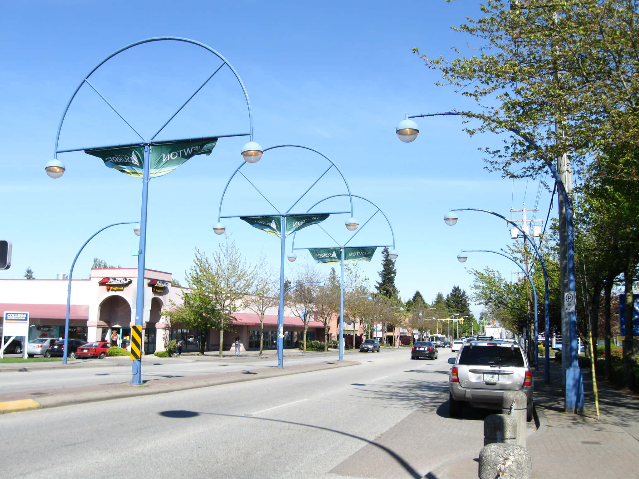 Surrey, blue arched streetlights, budding trees, Full HD Desktop Wallpaper