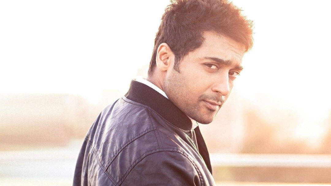 Surya HD, dark jacket, soft sunset glow, SD Desktop Wallpaper