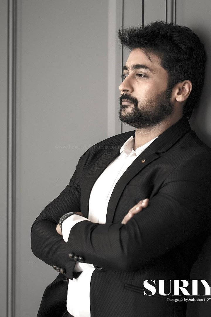 Surya, black suit, gray wall, SD Phone Wallpaper