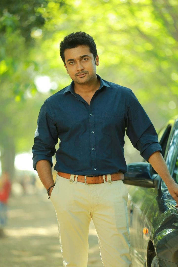 Surya, blue shirt, beige pants, SD Phone Wallpaper