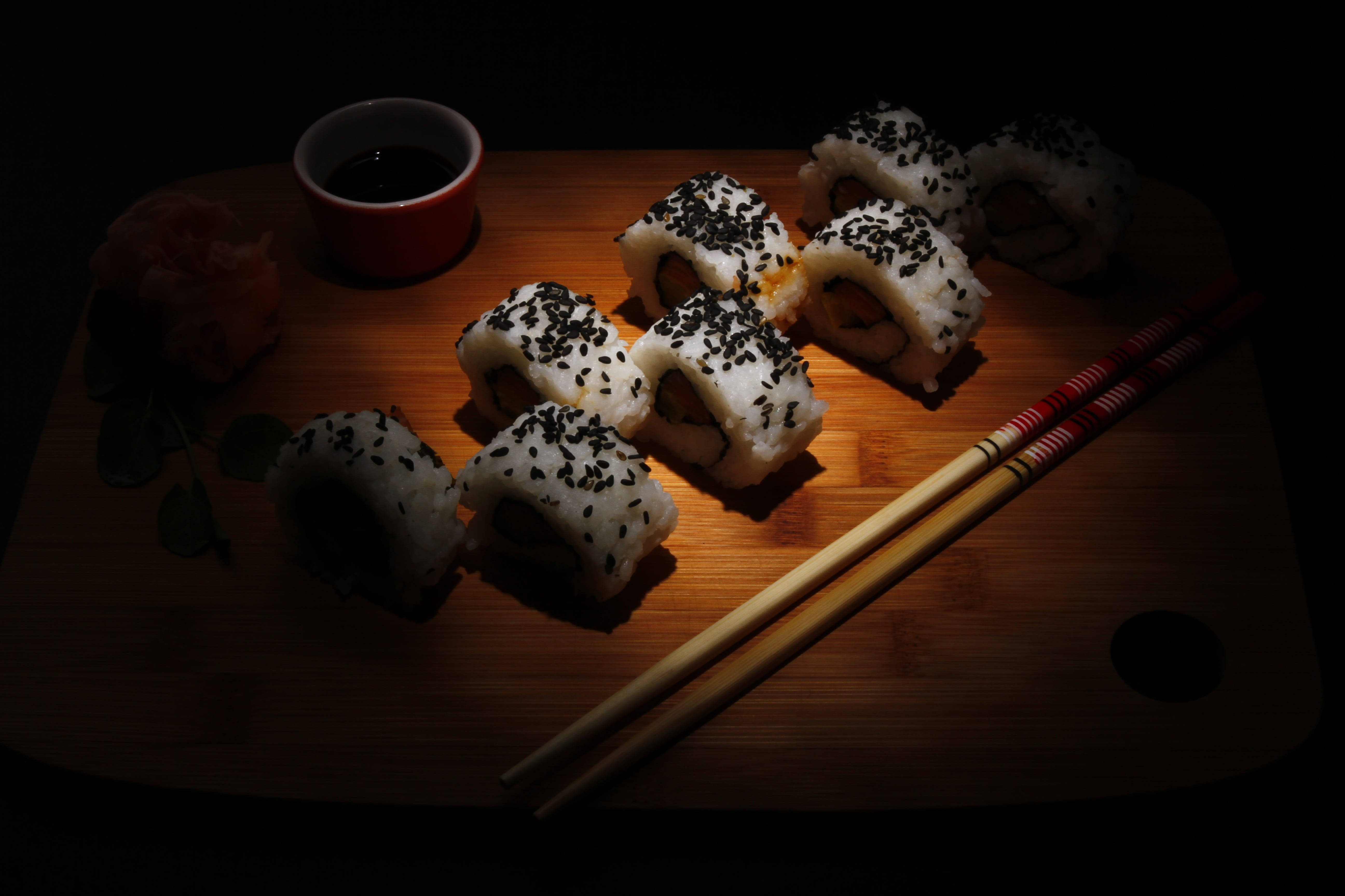 black sesame seeds, dramatic spotlight, wooden board, 5K Desktop Wallpaper