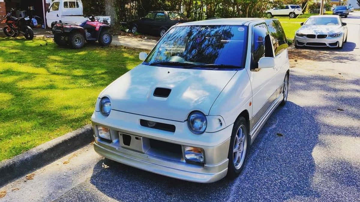 Suzuki Alto, white compact car, sporty front bumper, SD Desktop Wallpaper