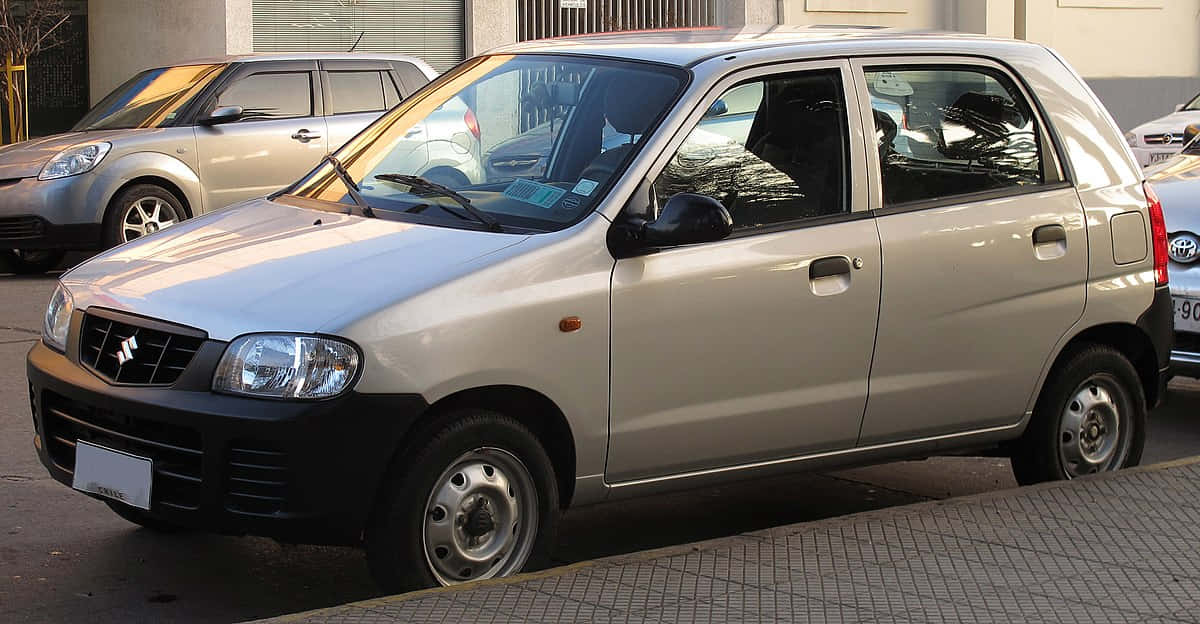 Suzuki Alto, beige, paved street, SD Desktop Wallpaper