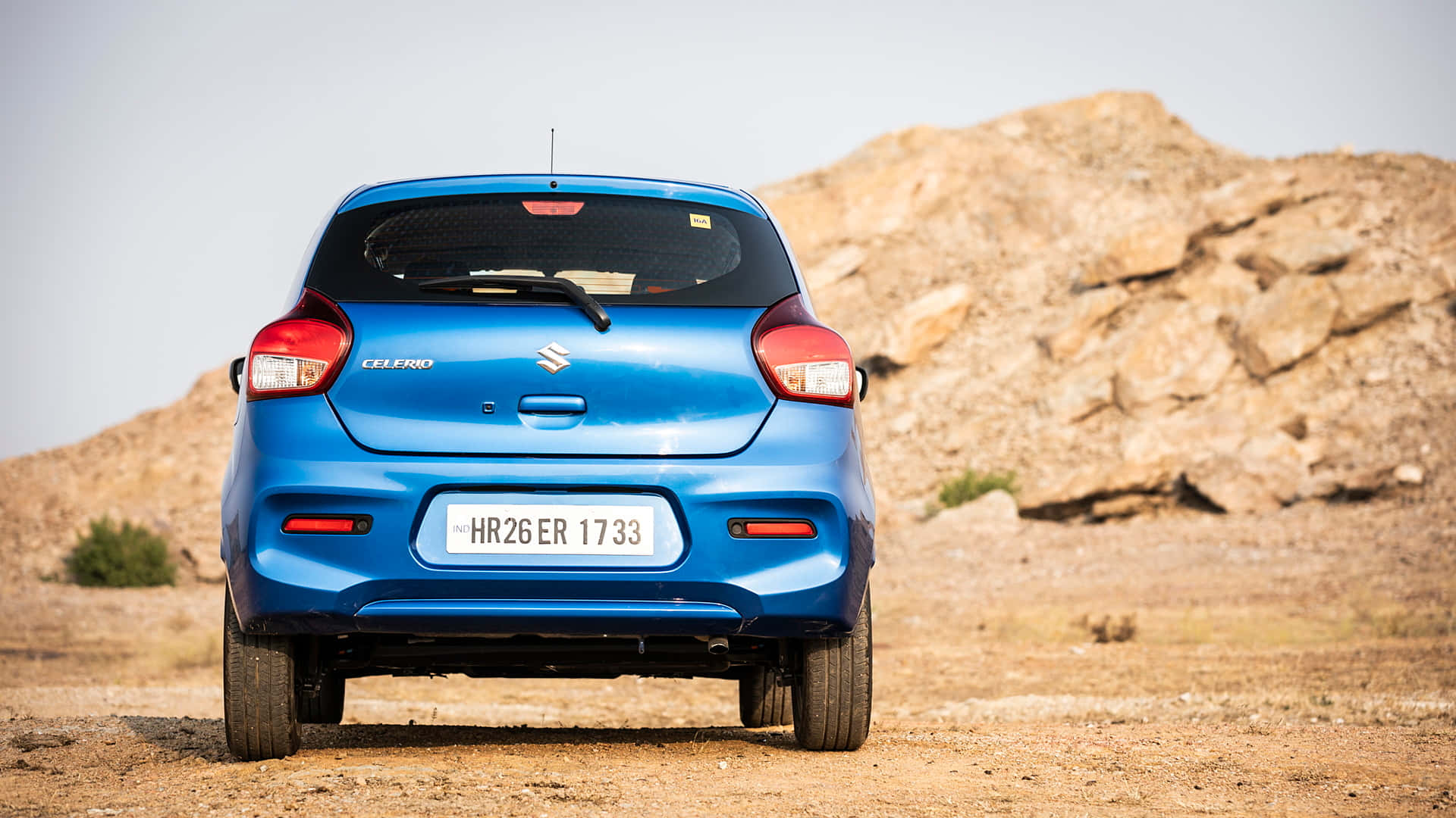 Suzuki Celerio, vibrant blue, dusty terrain, Full HD Desktop Wallpaper