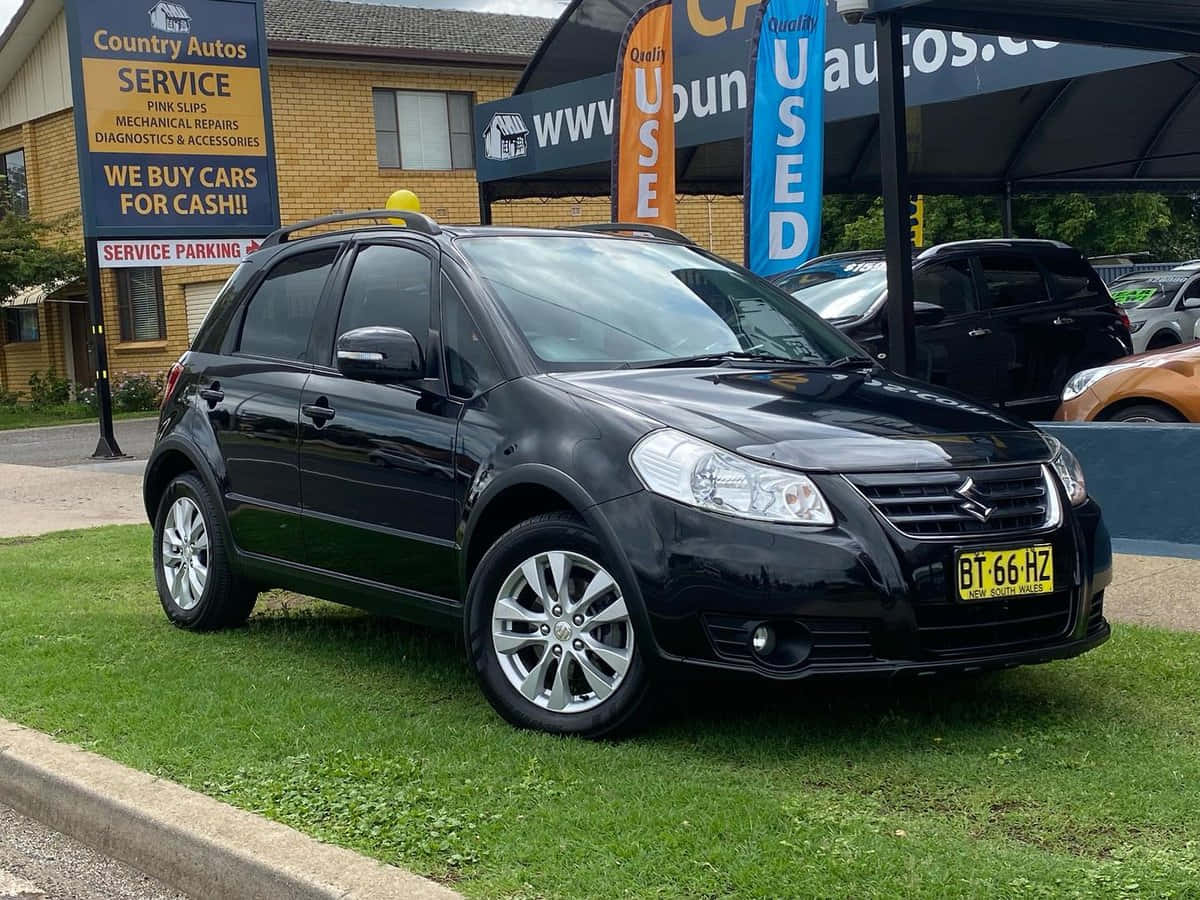 Suzuki SX4, glossy black, grass, SD Desktop Wallpaper