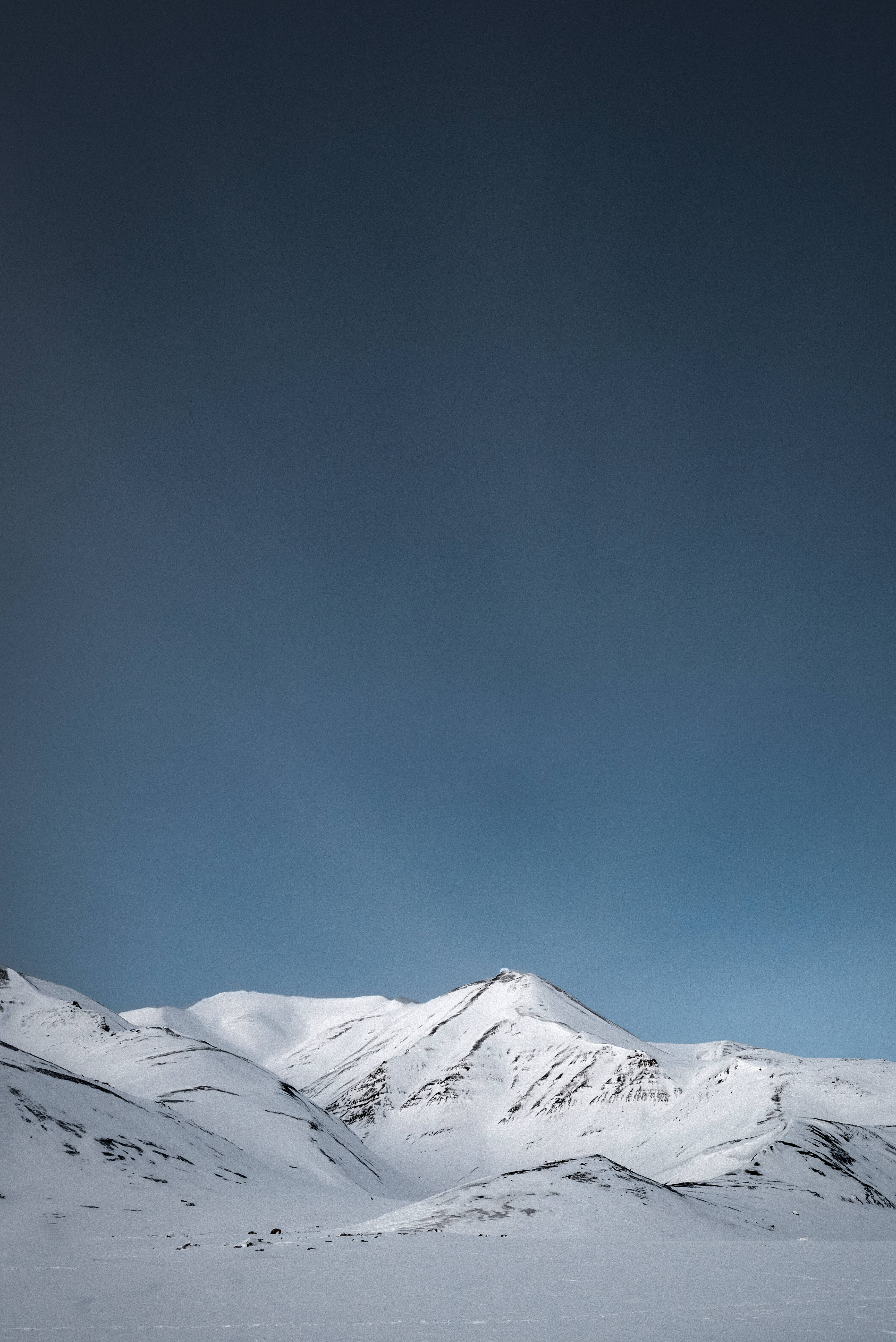 Svalbard, dark blue sky, snow-capped mountain peaks, 5K Phone Wallpaper