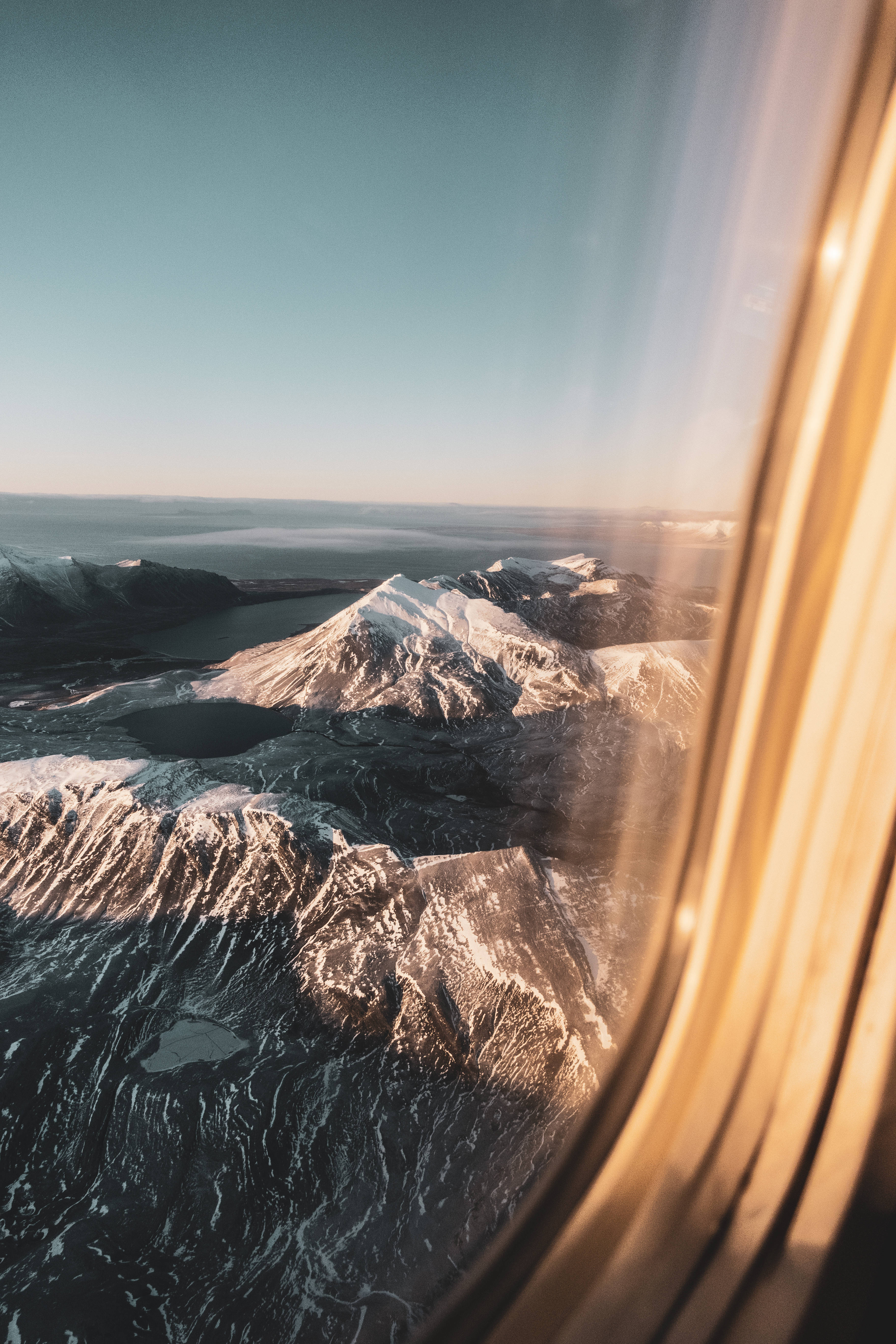 Svalbard, snowy black mountains, fjords, 5K Phone Wallpaper