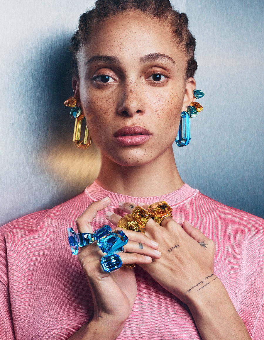 Swarovski, blue and gold geometric earrings, blue wall, SD Phone Wallpaper