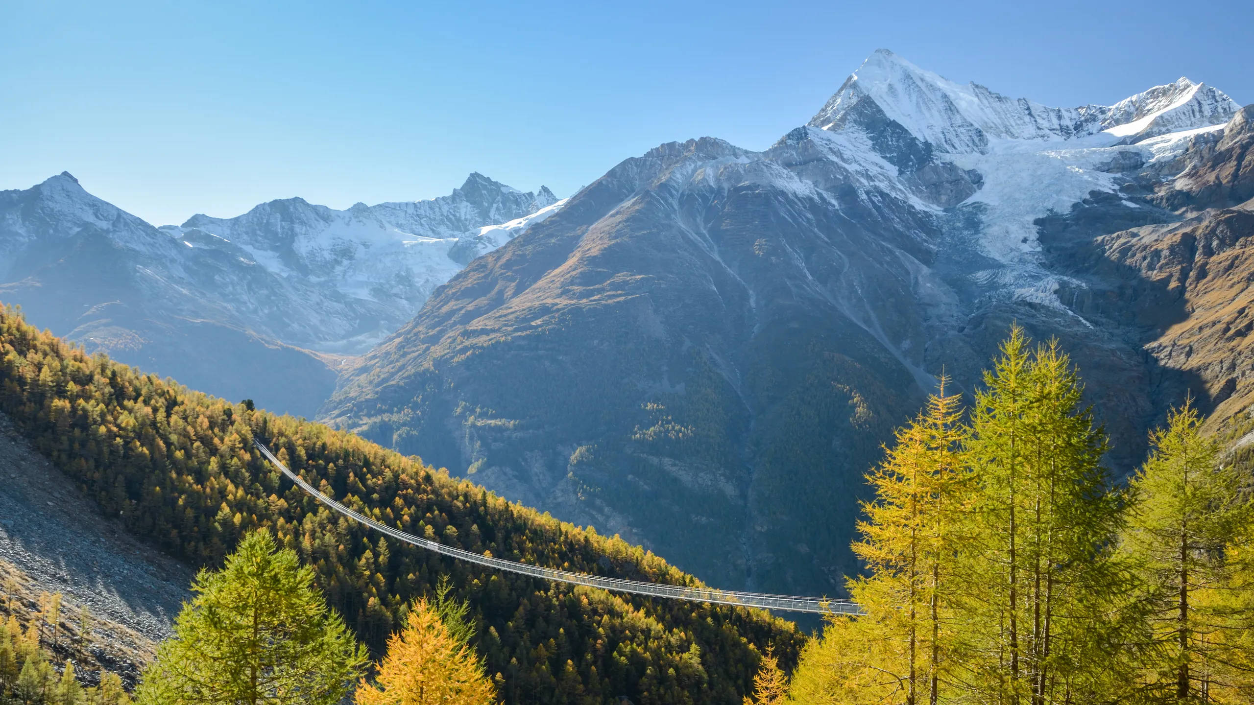 Swiss Alps, snow-capped mountains, clear blue sky, 2K Desktop Wallpaper