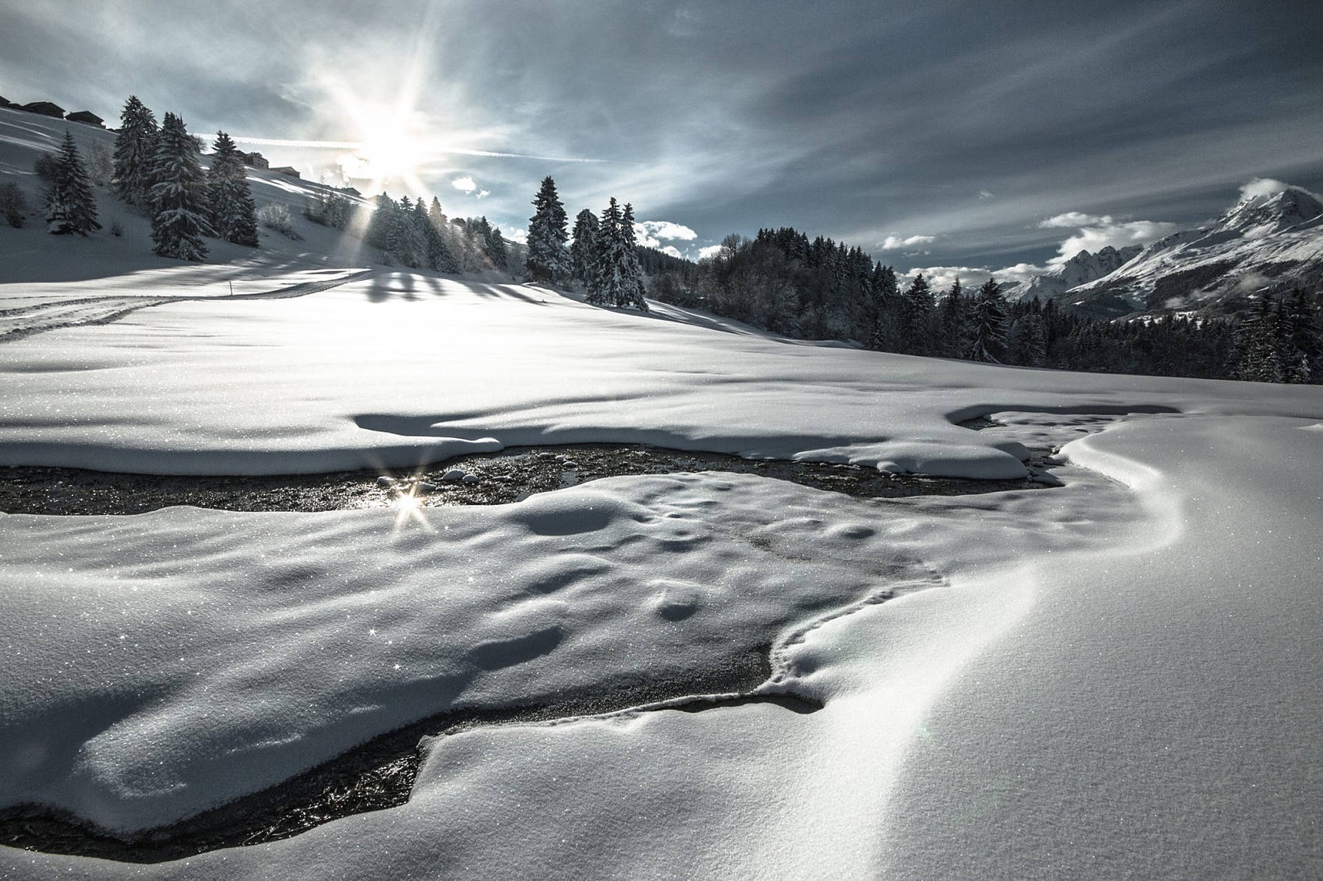 Swiss Alps, snow-covered valley, winding stream, Full HD Desktop Wallpaper