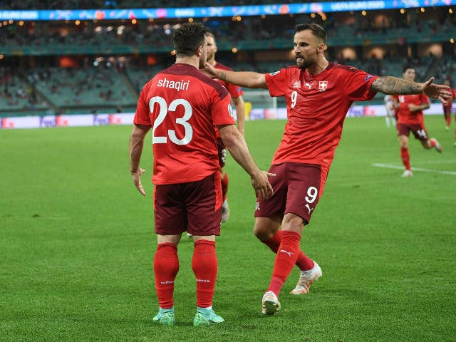 Switzerland National Football Team, red jerseys, vibrant green pitch, SD Desktop Wallpaper
