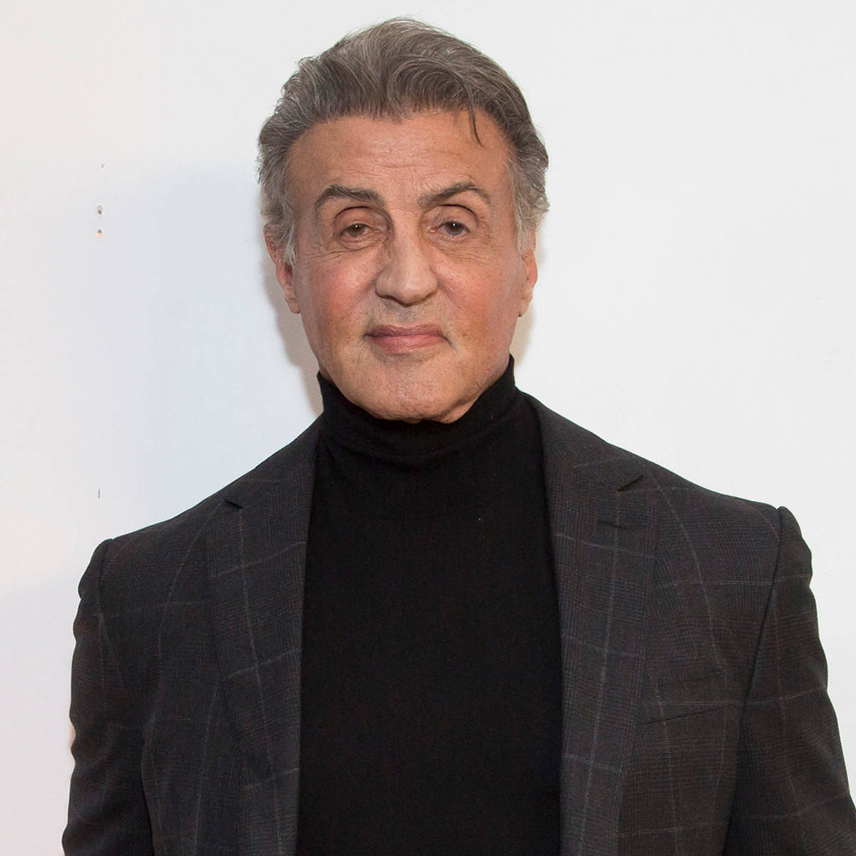 Sylvester Stallone, dark plaid suit, black turtleneck, SD Desktop Wallpaper