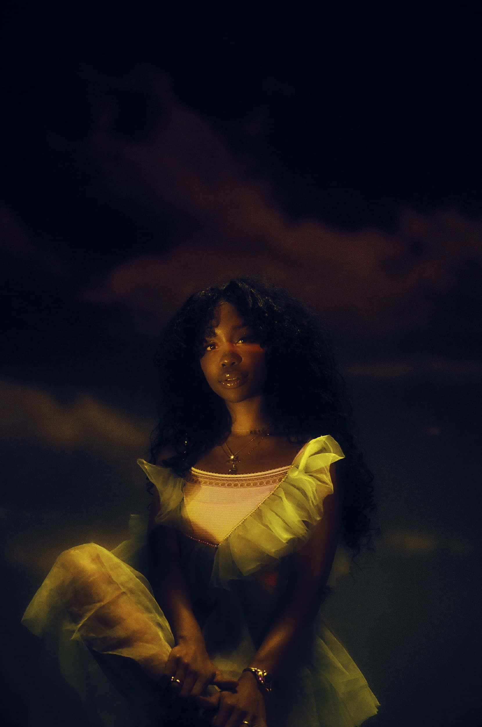 glowing yellow dress, dark moody sky, dramatic clouds, Full HD Phone Wallpaper