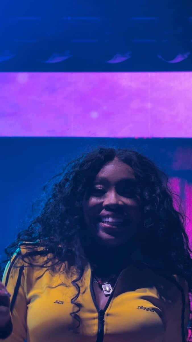 SZA, purple backdrop, vibrant blue and purple stage lights, SD Phone Wallpaper