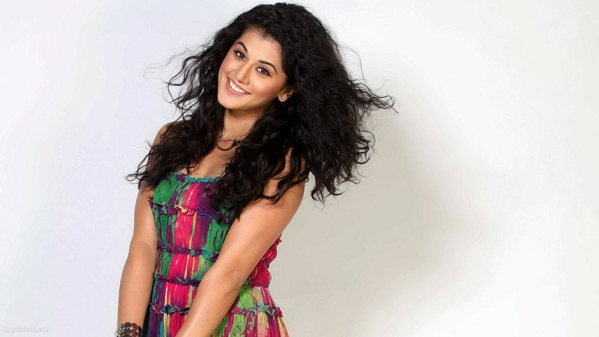 Taapsee Pannu, flowing dark hair, vibrant multicolored dress, Full HD Desktop Wallpaper