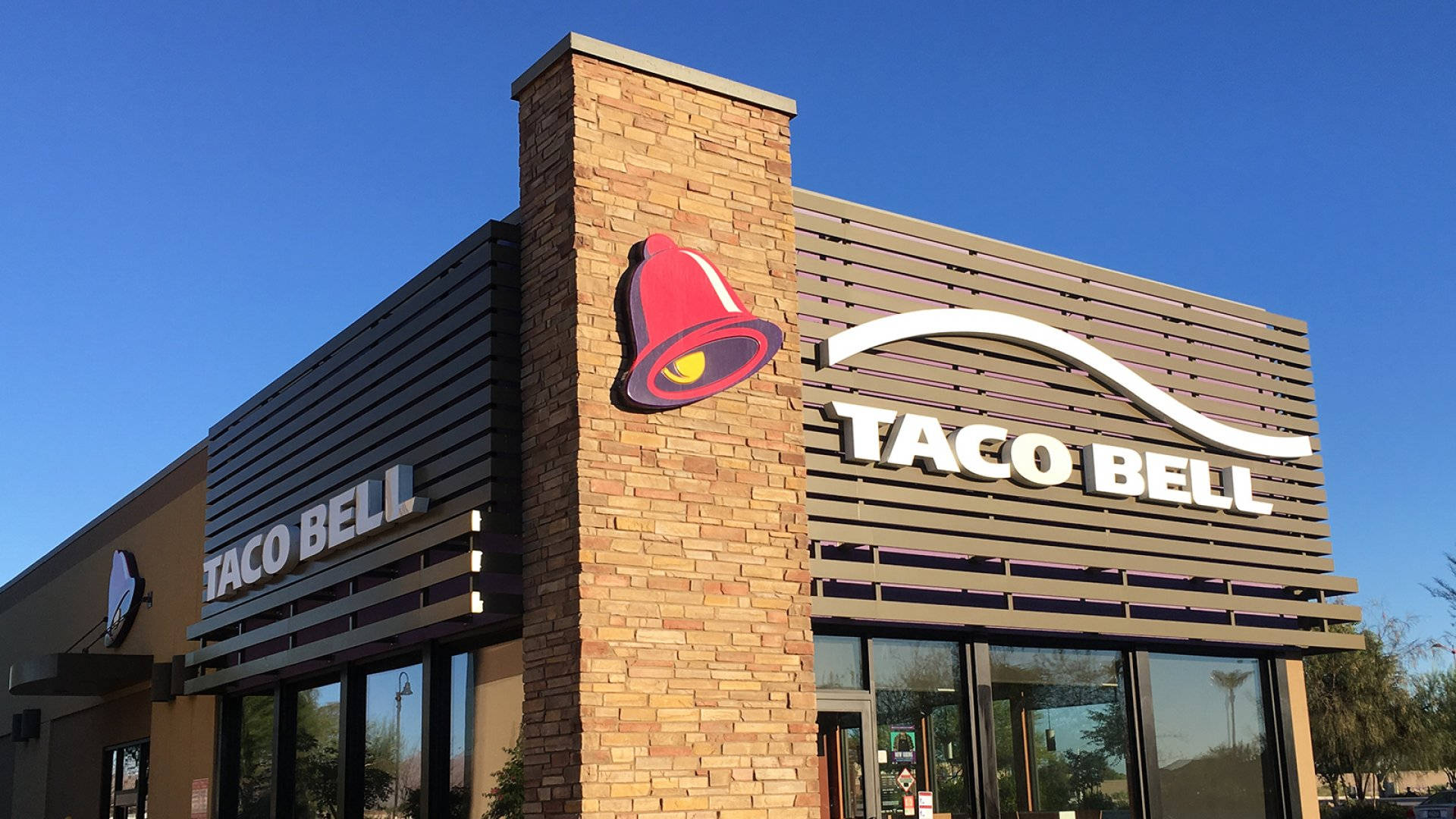 Taco Bell, red Taco Bell bell logo, brick pillar, Full HD Desktop Wallpaper
