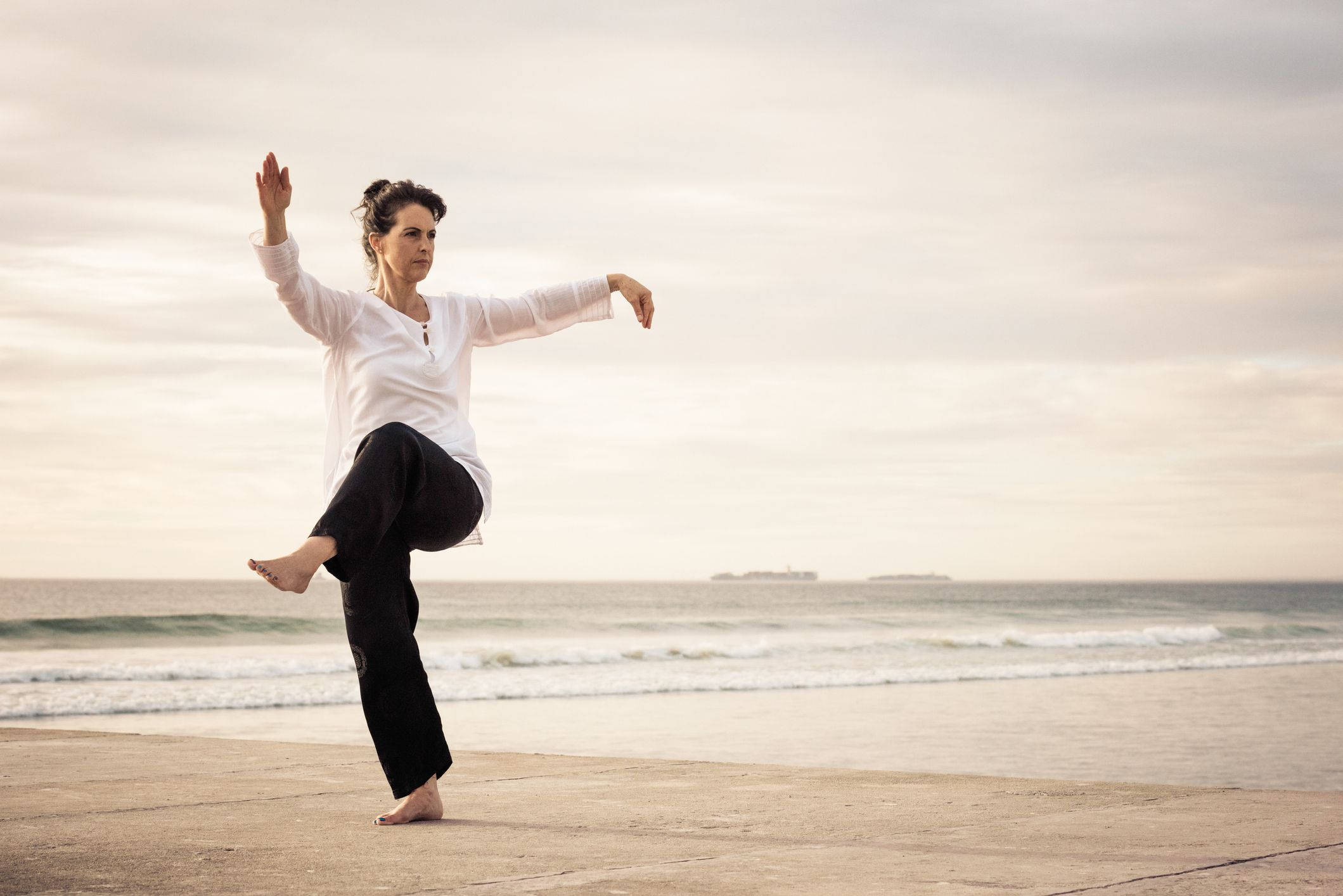 Tai Chi Balancing Exercise, seaside boardwalk, golden hour, Full HD Desktop Wallpaper