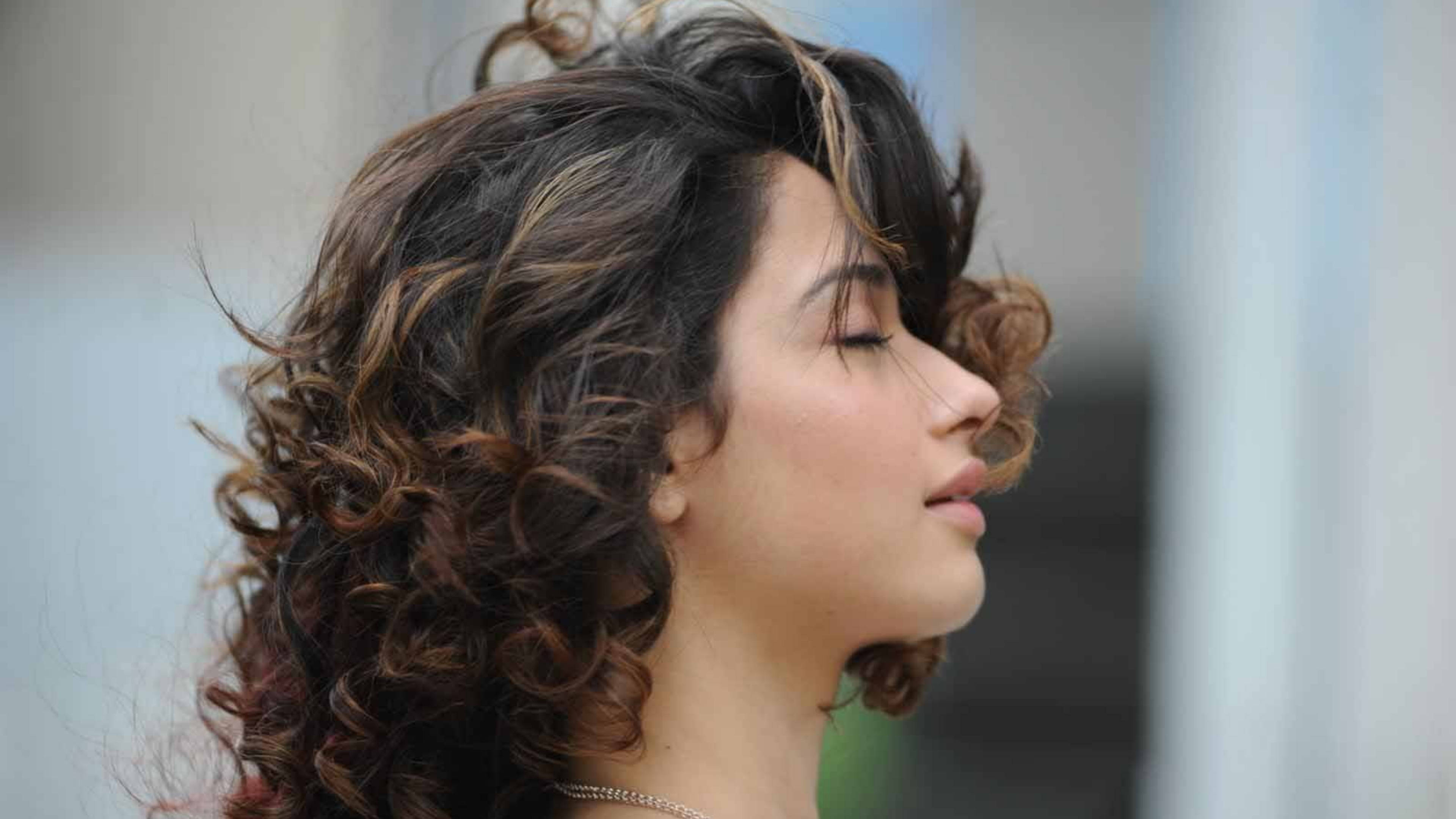 Tamannaah Bhatia, voluminous curly brown hair, peaceful repose, 4K Desktop Wallpaper