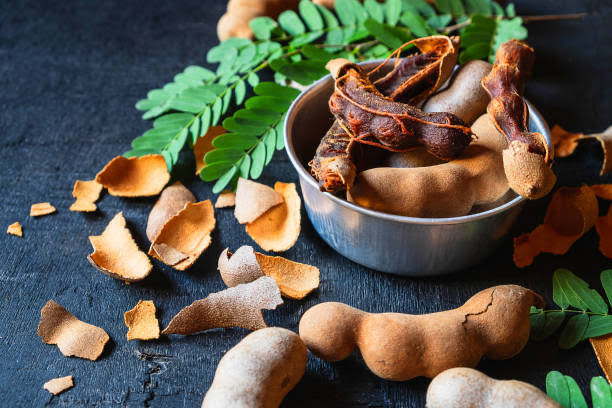 cracked shells tamarind, rustic metal bowl, dried tamarind pods, SD Desktop Wallpaper