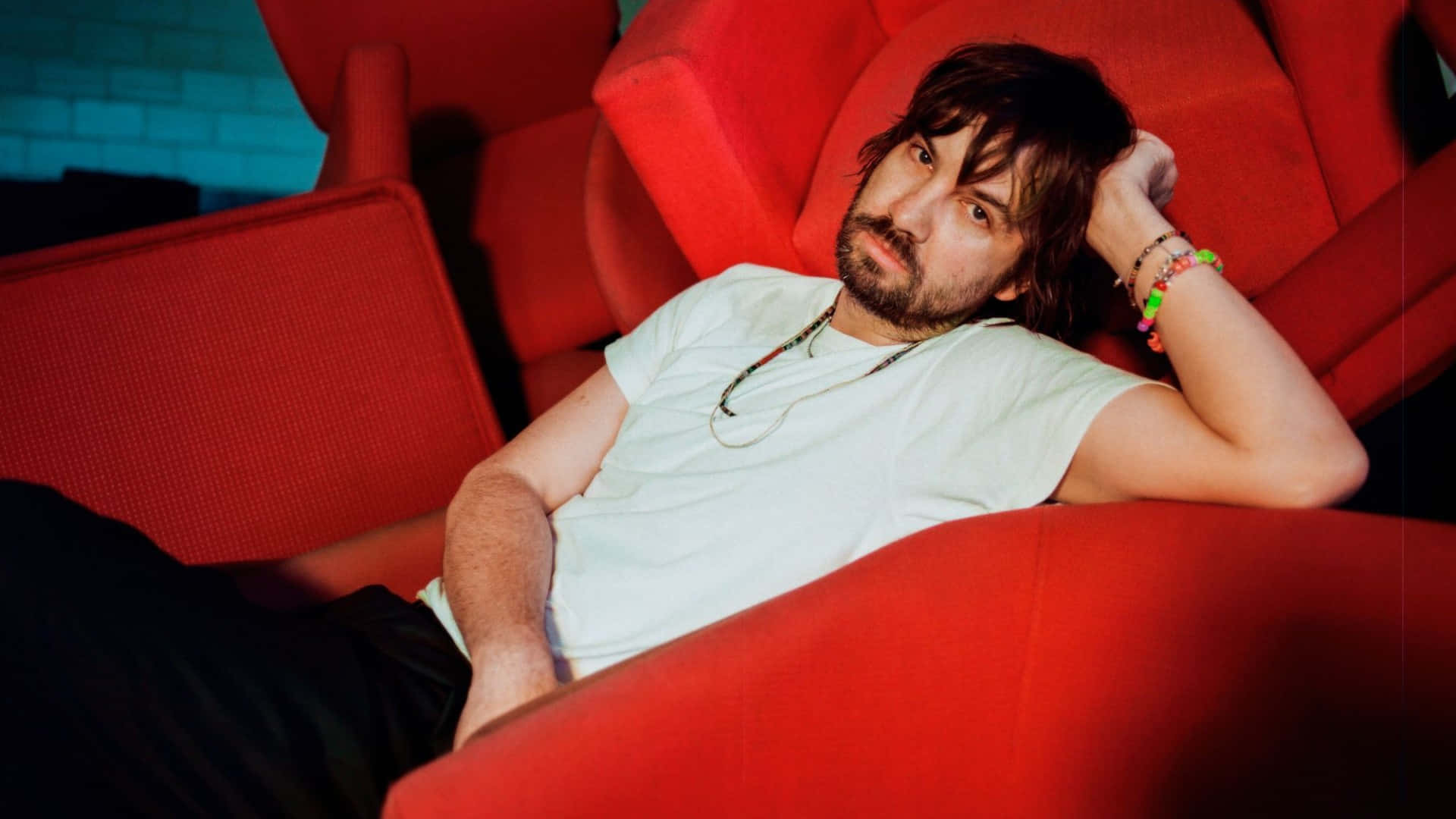 Tame Impala, vibrant red theater seat, white t-shirt, Full HD Desktop Wallpaper