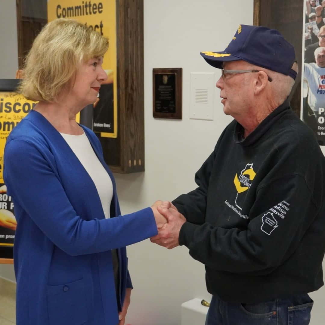 Tammy Baldwin, blue blazer, navy cap, SD Desktop Wallpaper