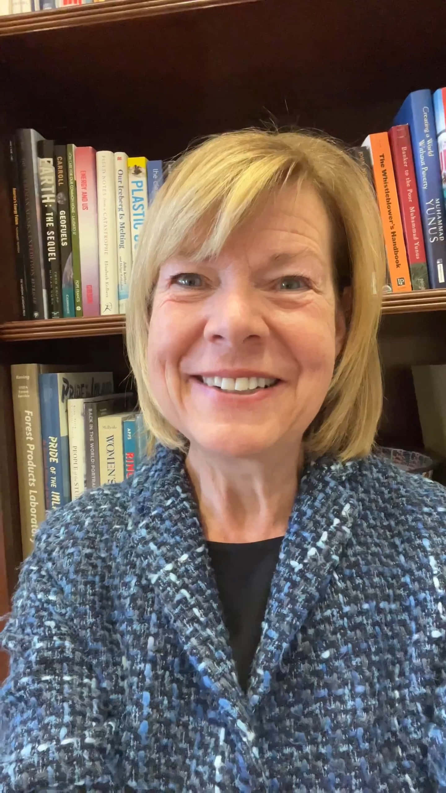 Tammy Baldwin, blue textured blazer, bookshelves, 2K Phone Wallpaper