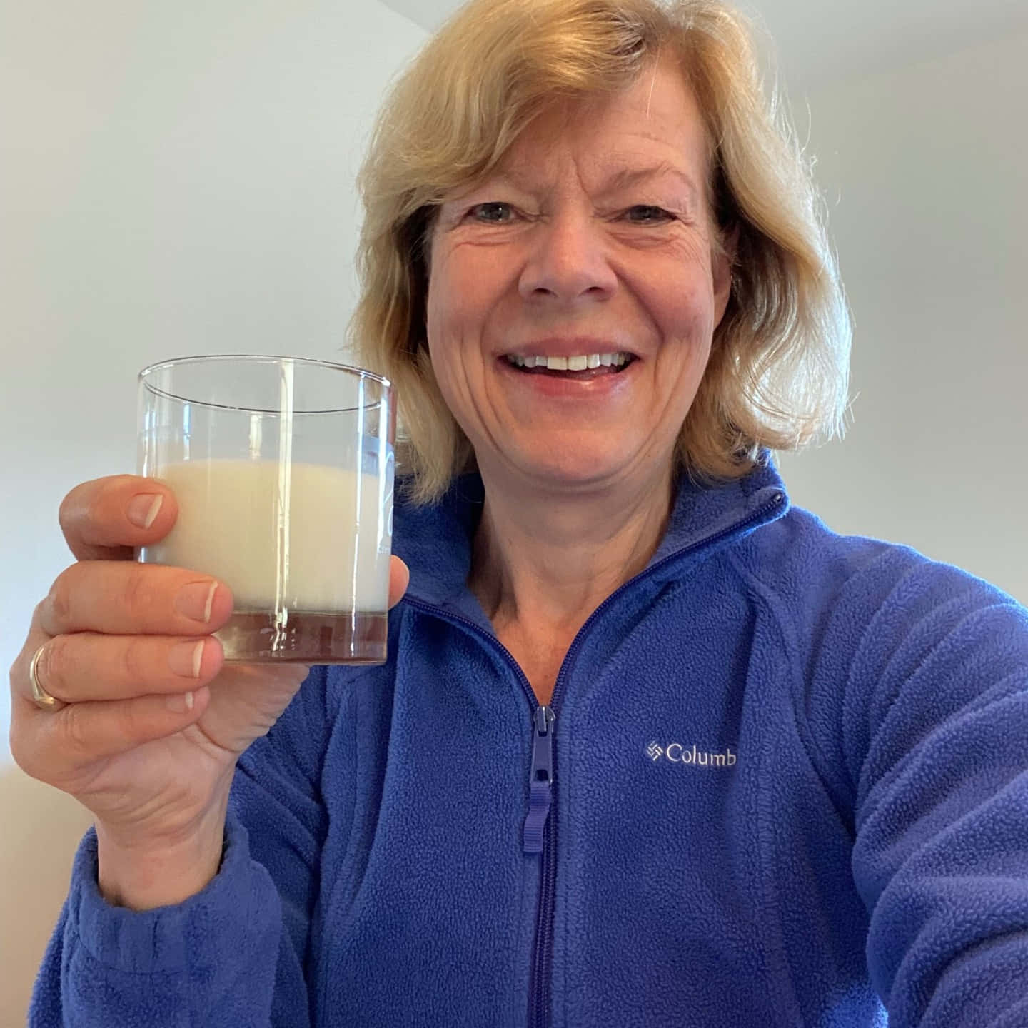 Tammy Baldwin, blue fleece jacket, glass of milk, HD Desktop Wallpaper