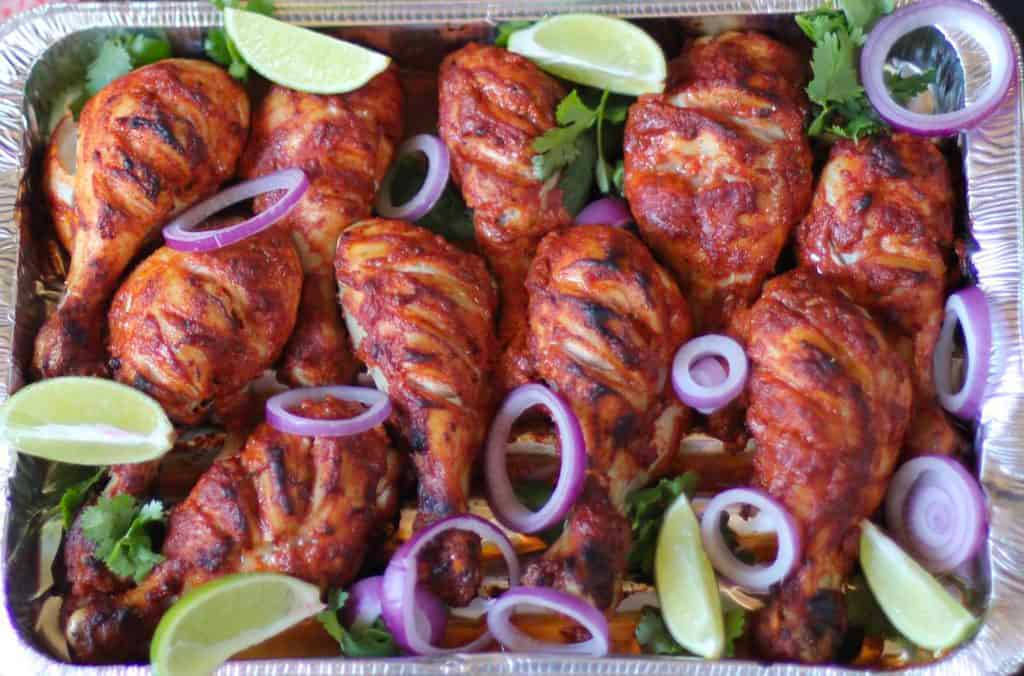 Grilled Tandoori Chicken Legs, red spice sauce, lime wedges, SD Desktop Wallpaper