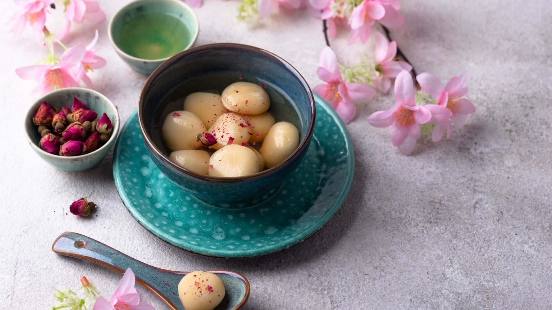 teal ceramic bowl, pale yellow glutinous rice balls, clear broth, Full HD Desktop Wallpaper