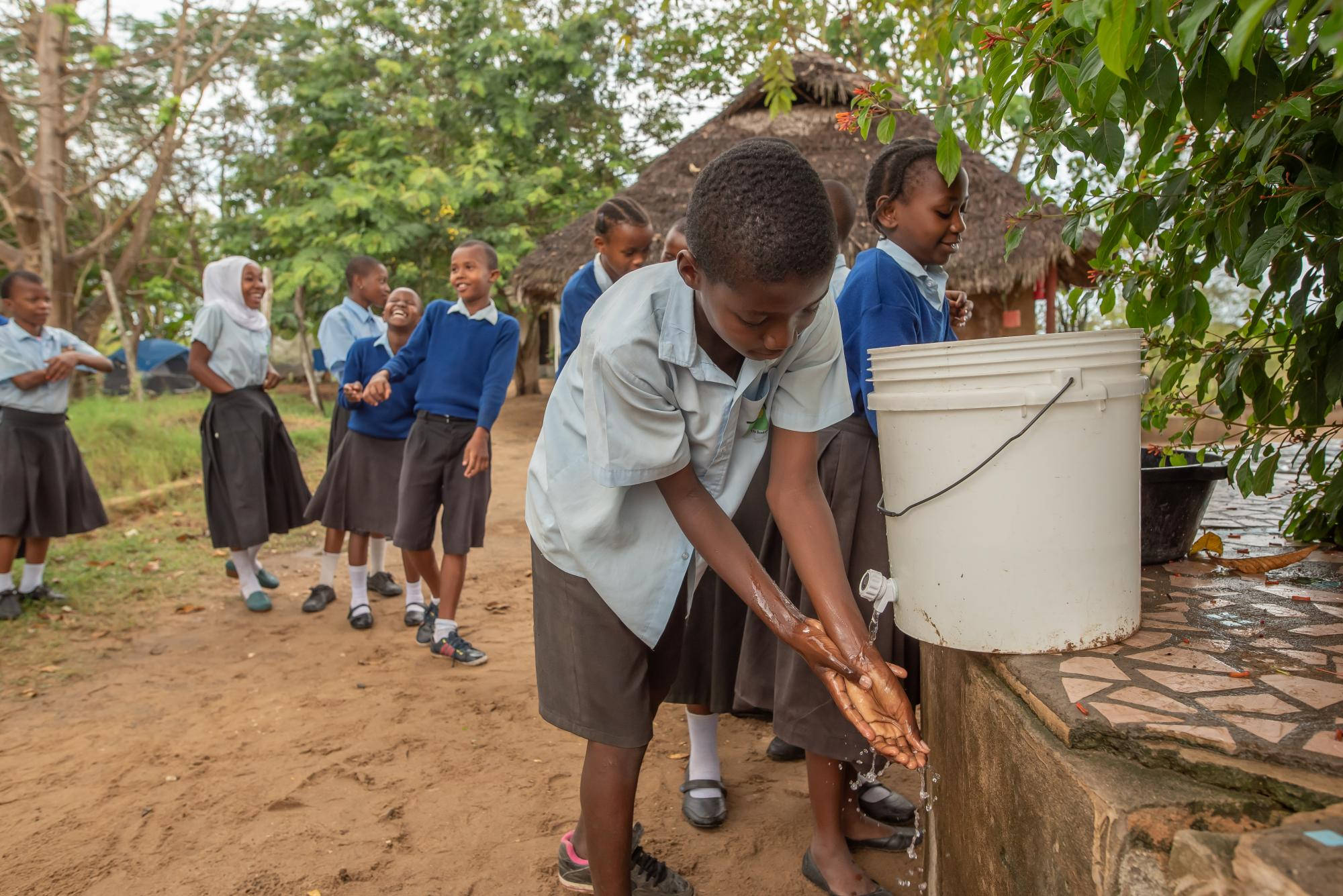 Tanzania, rural schoolyard, outdoor water station, Full HD Desktop Wallpaper