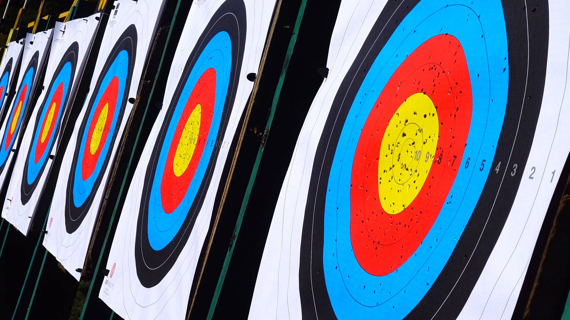 archery targets, colorful concentric rings, arrow holes, Full HD Desktop Wallpaper