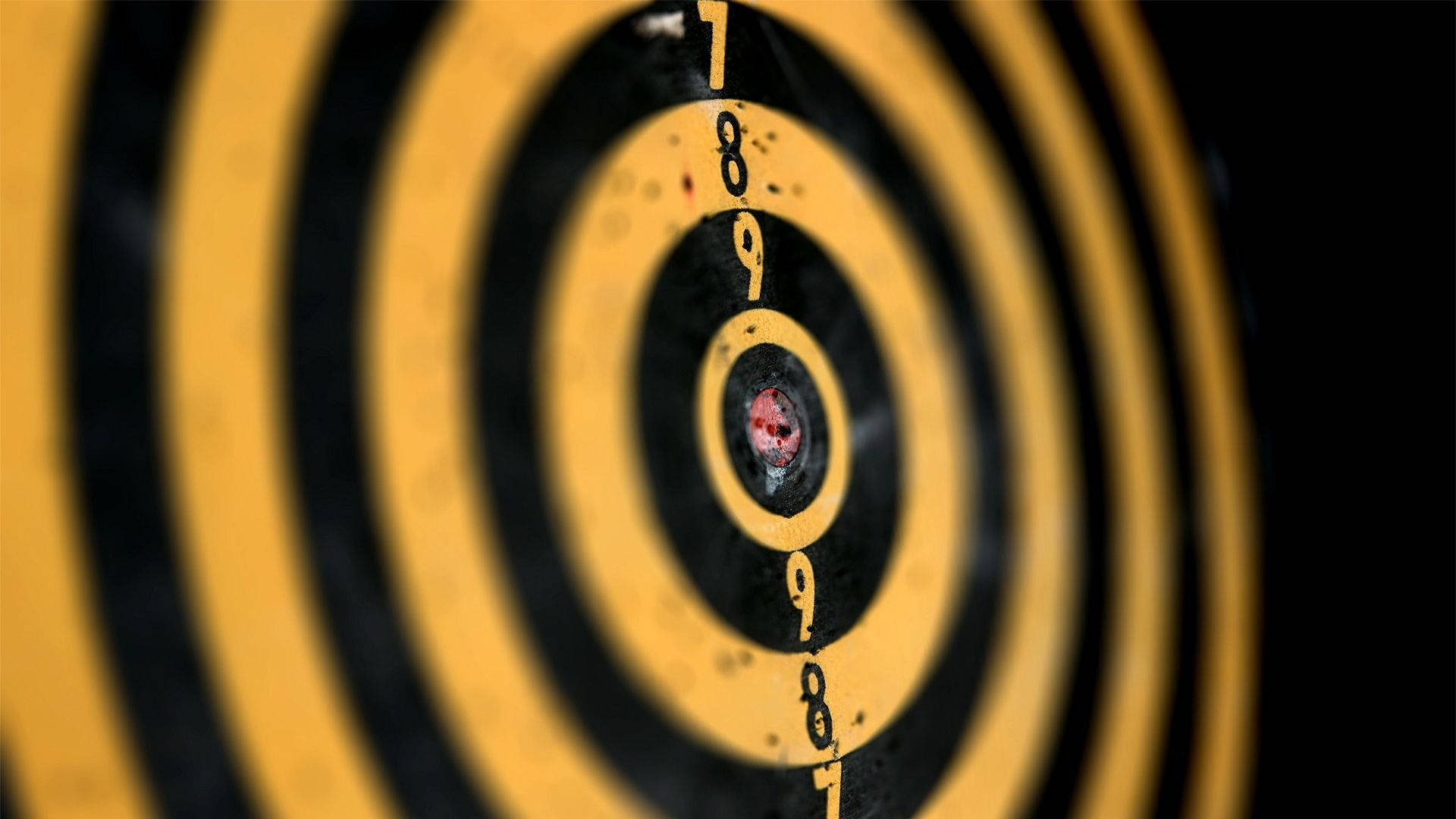 yellow and black dartboard, red dart, center bullseye, Full HD Desktop Wallpaper