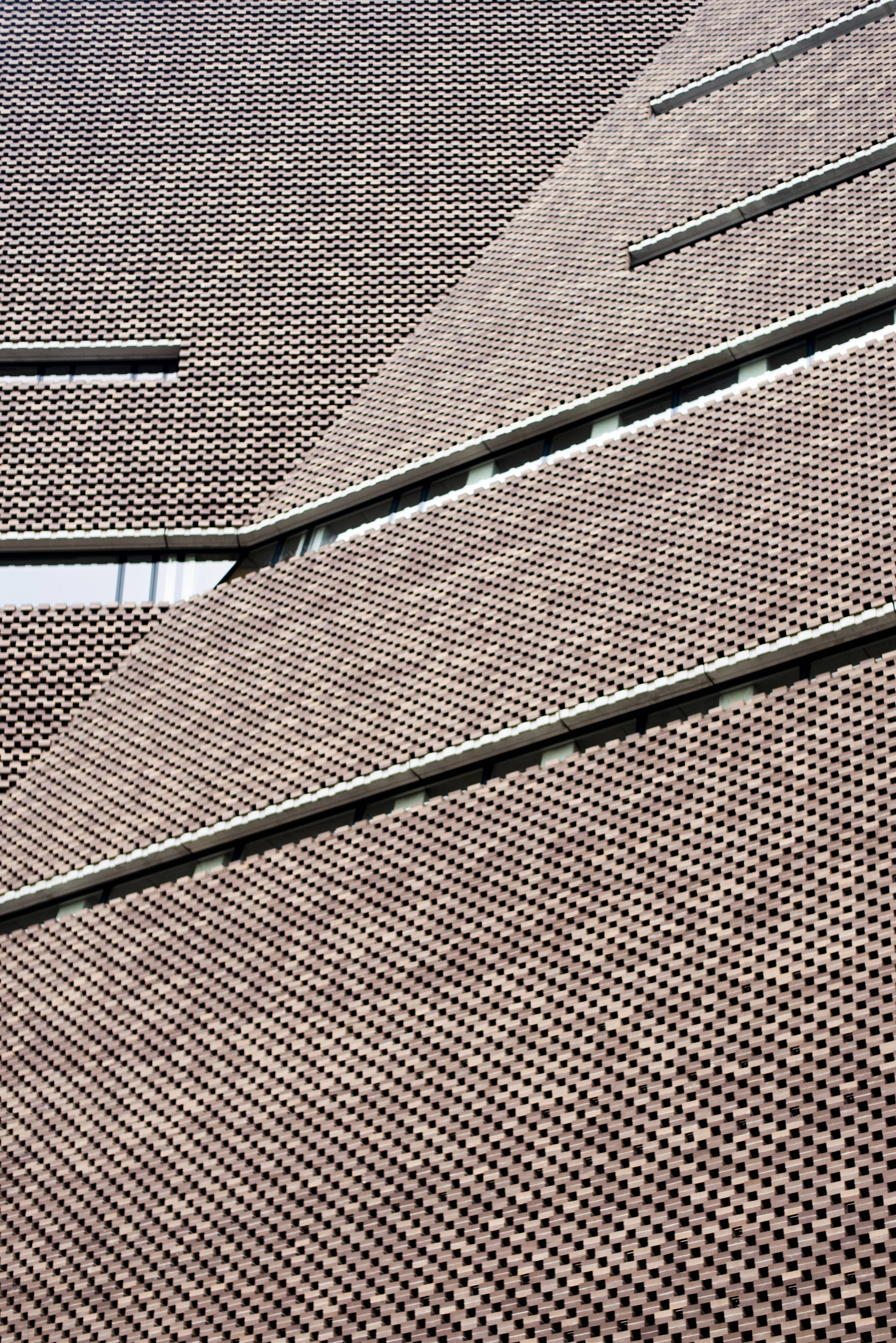 Tate Modern, textured brown brick facade, geometric lines, 5K Phone Wallpaper