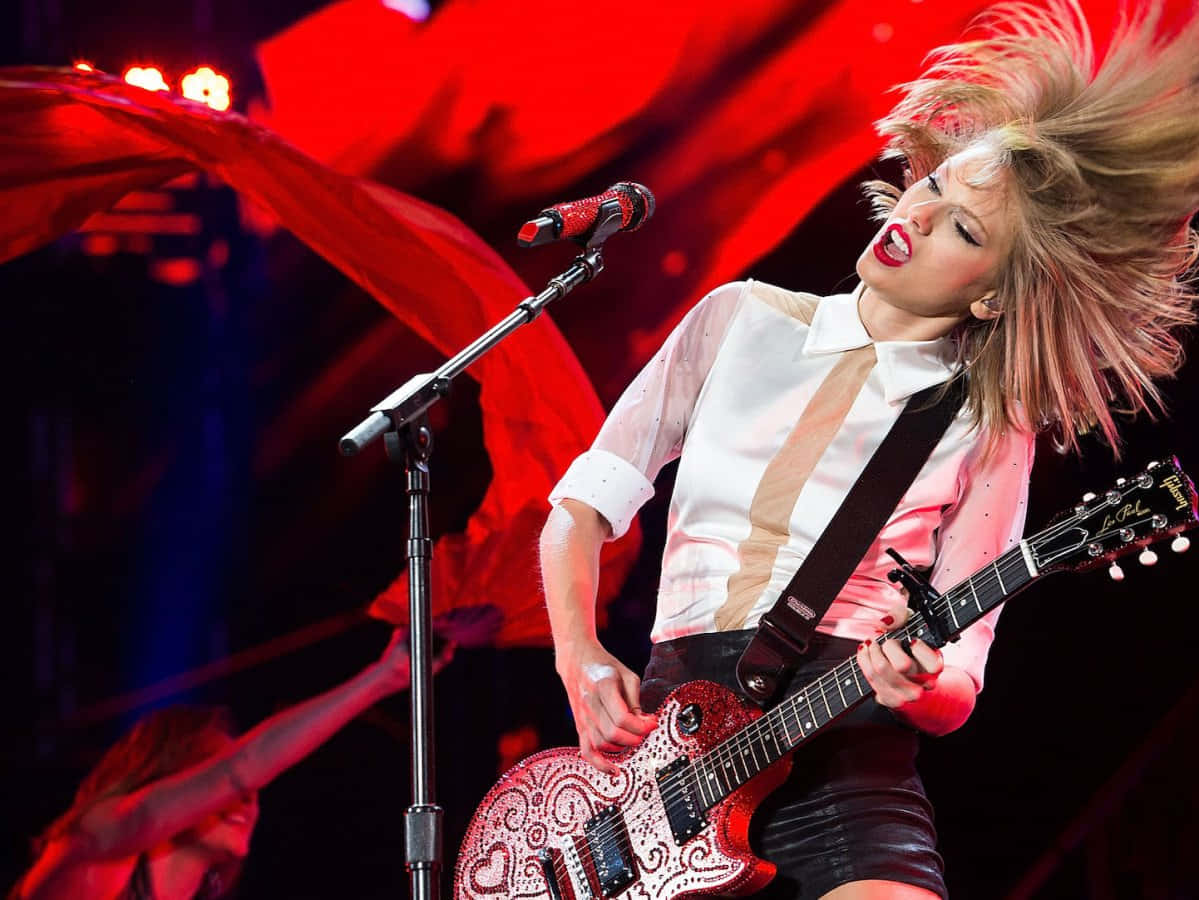 red patterned electric guitar, intense red stage lights, female singer, SD Desktop Wallpaper