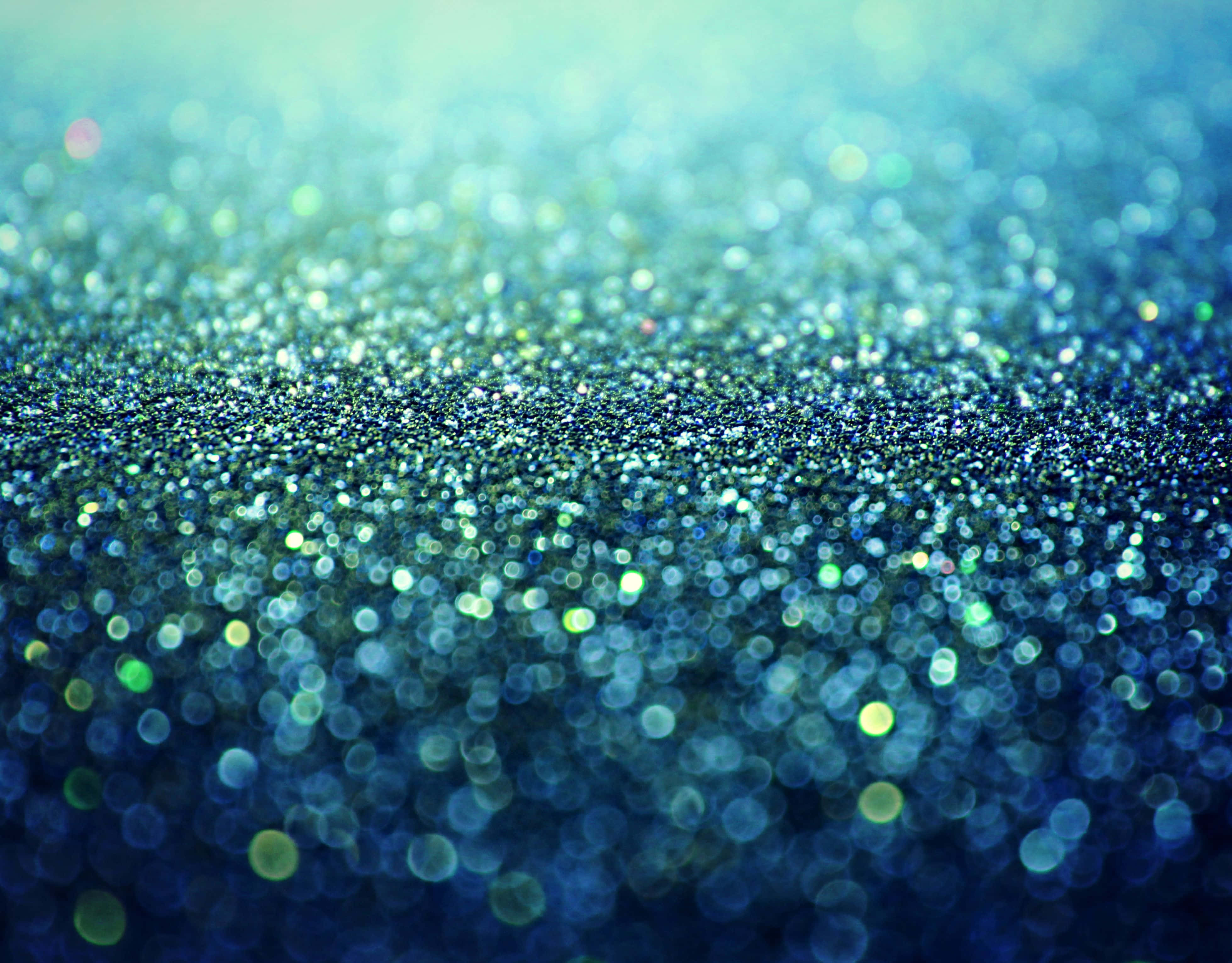 Teal Blue, shimmering blue and green glitter particles, soft bokeh highlights, 4K Desktop Wallpaper