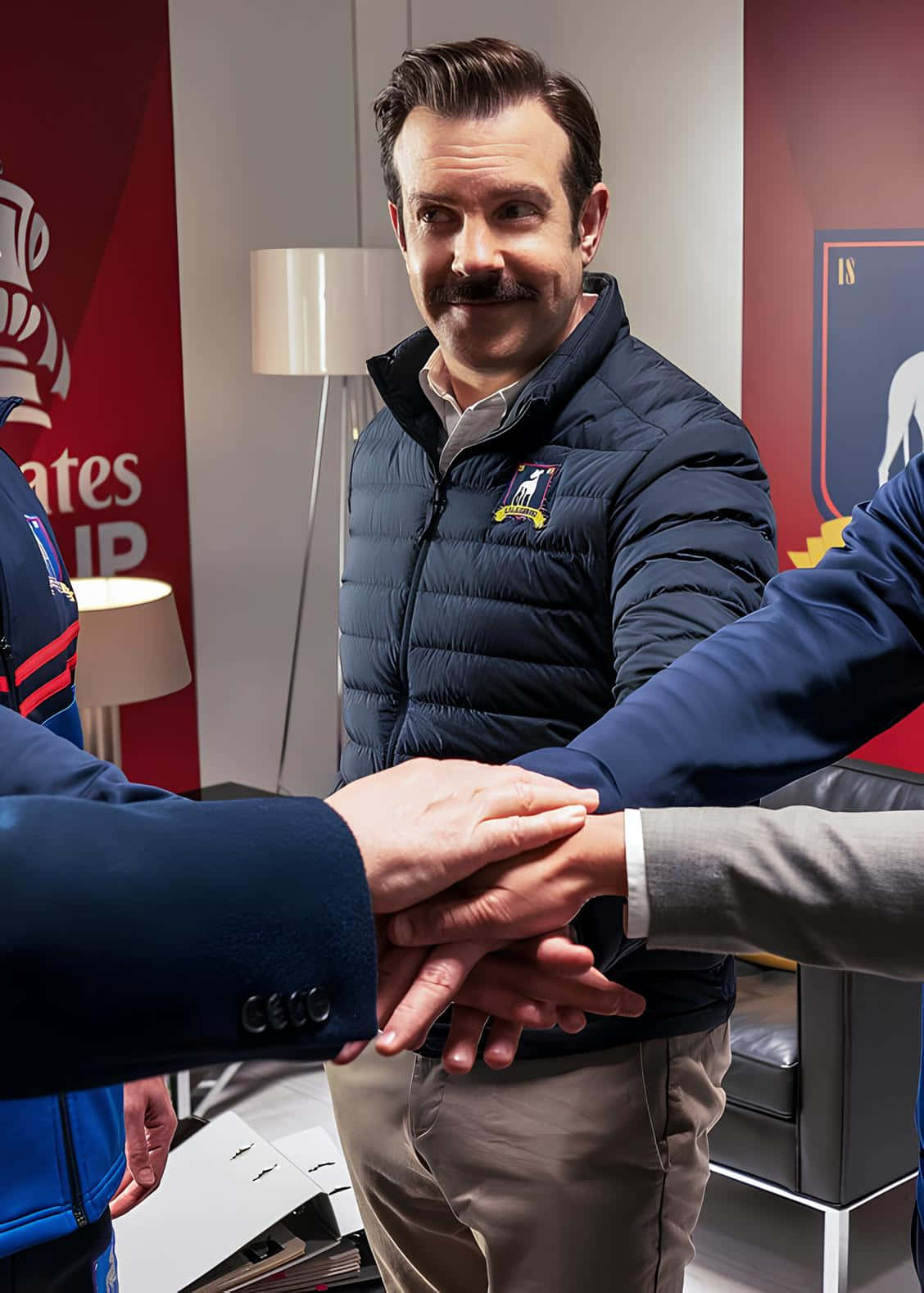 Ted Lasso, navy puffer jacket, team huddle, HD Phone Wallpaper