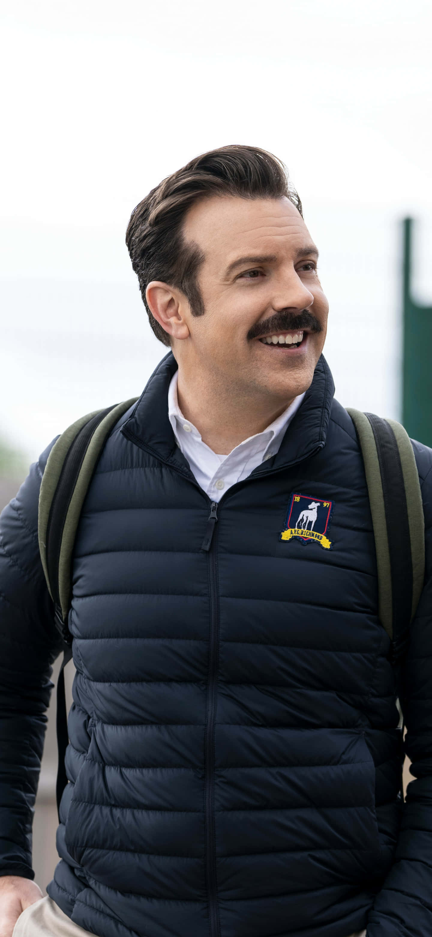 Ted Lasso, mustache, dark puffer vest, 2K Phone Wallpaper