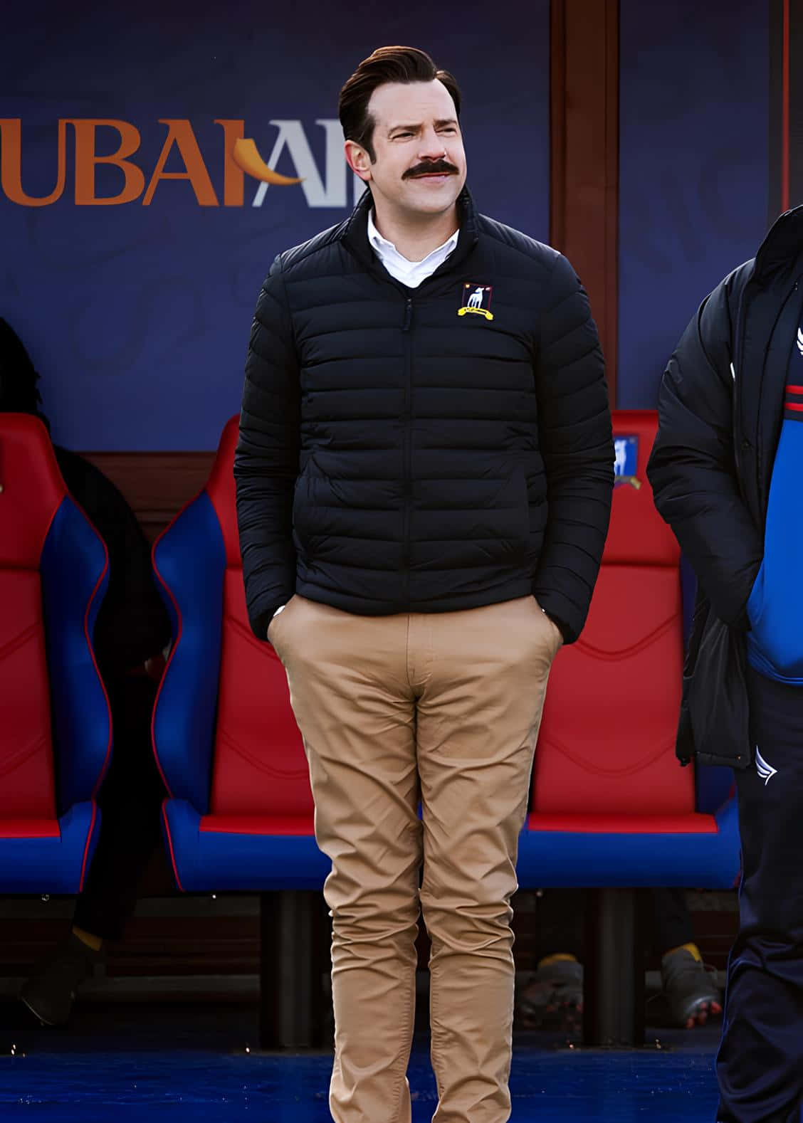 Ted Lasso, sideline pose, black puffer jacket, HD Phone Wallpaper