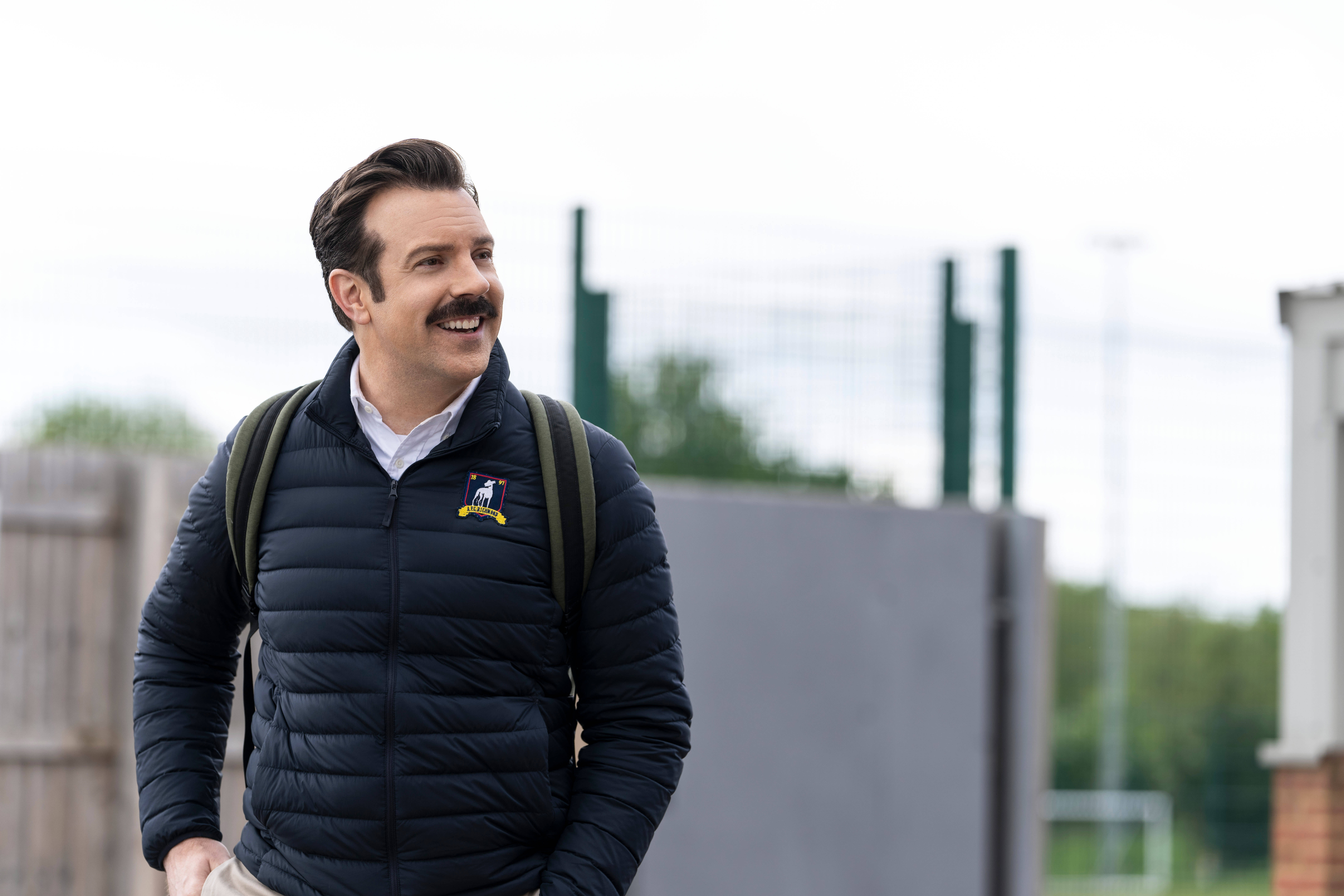Ted Lasso, dark puffer jacket, mustache, 8K Desktop Wallpaper