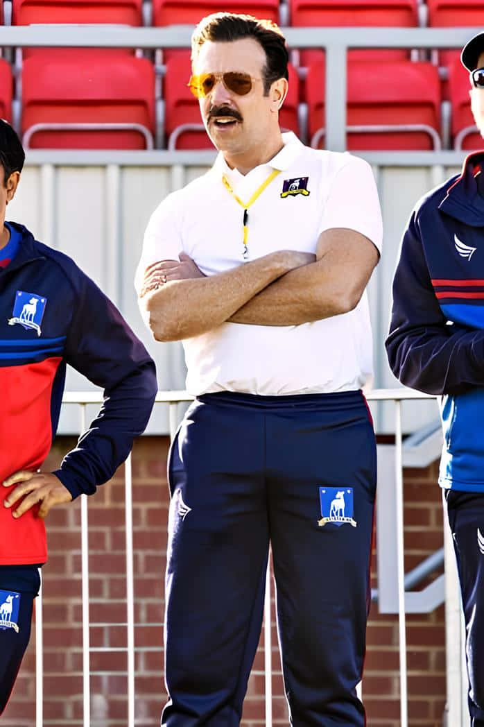 Ted Lasso, stadium, white polo, SD Phone Wallpaper