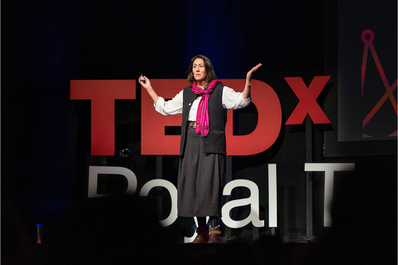 TEDx Talks, dimly lit TEDx stage, bold red and white branding, HD Desktop Wallpaper