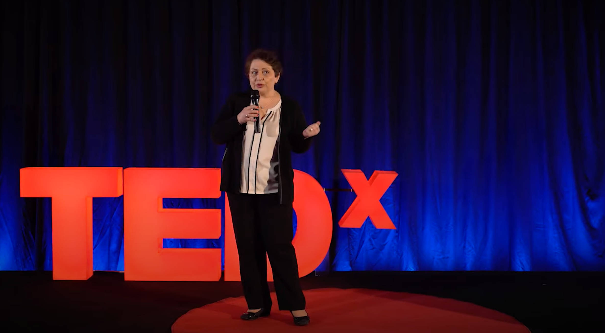 TEDx Talks, circular red stage, glowing orange TEDx letters, Full HD Desktop Wallpaper
