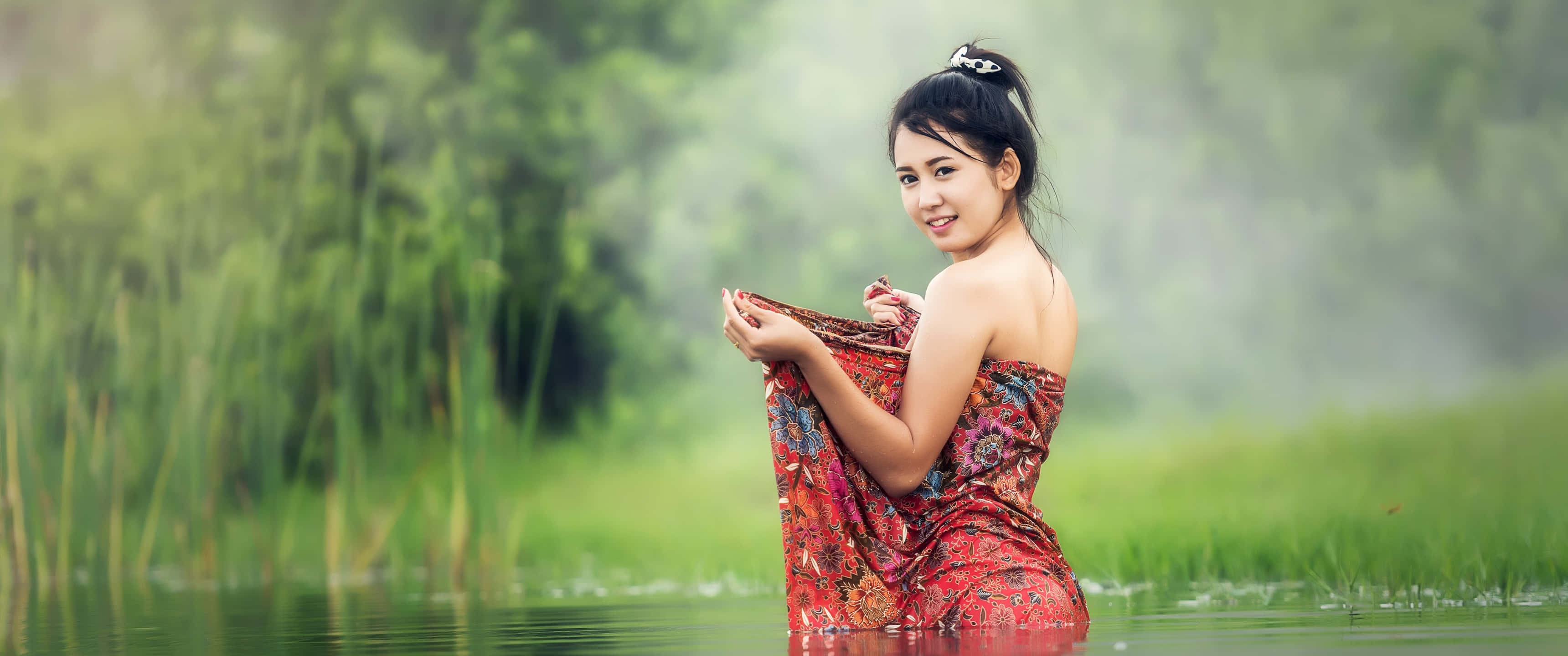 teen girl model, patterned red dress, misty green pond, 2K Desktop Wallpaper
