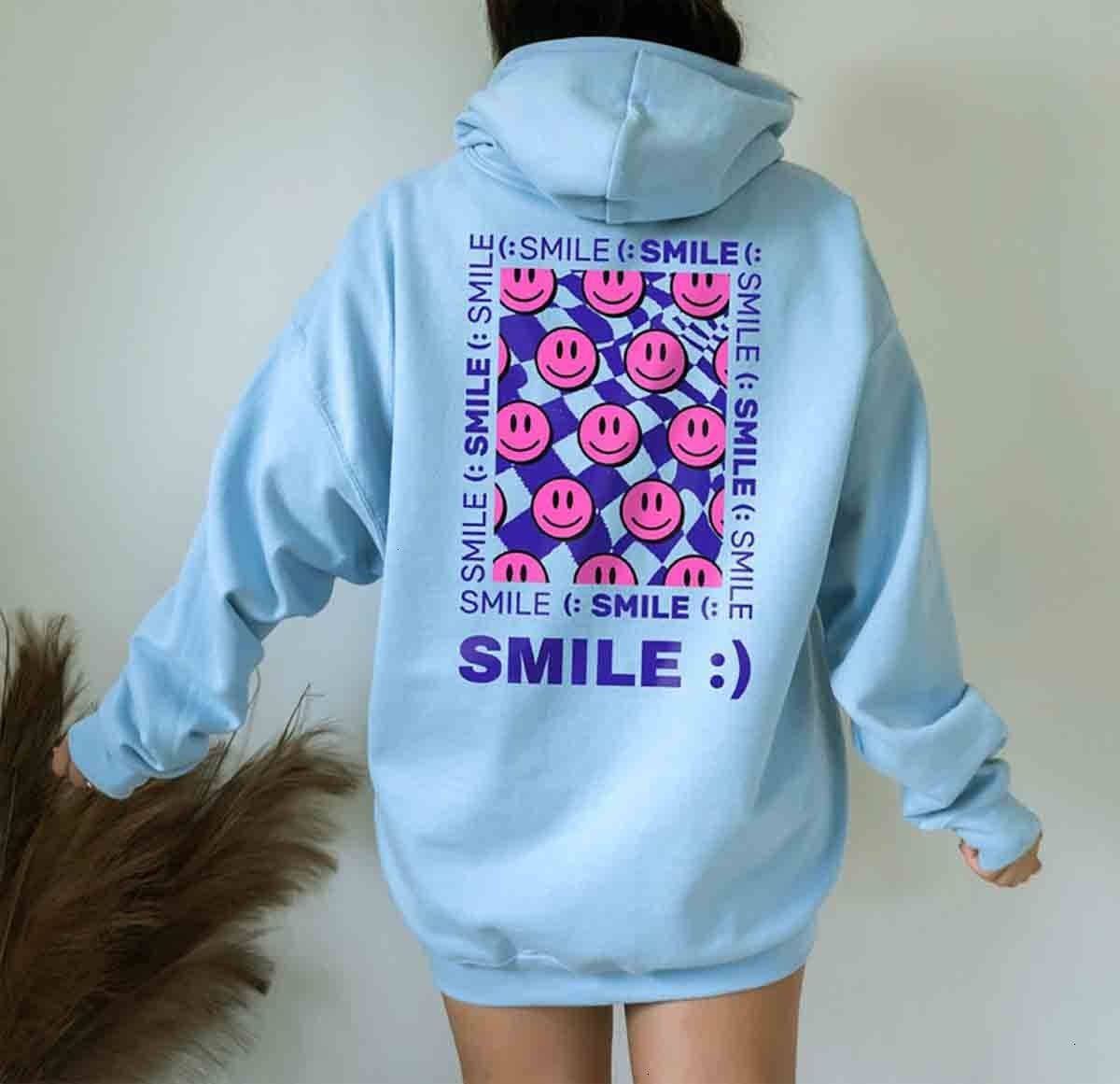 blue hoodie, light blue hoodie, bold pink smiley graphic, SD Desktop Wallpaper